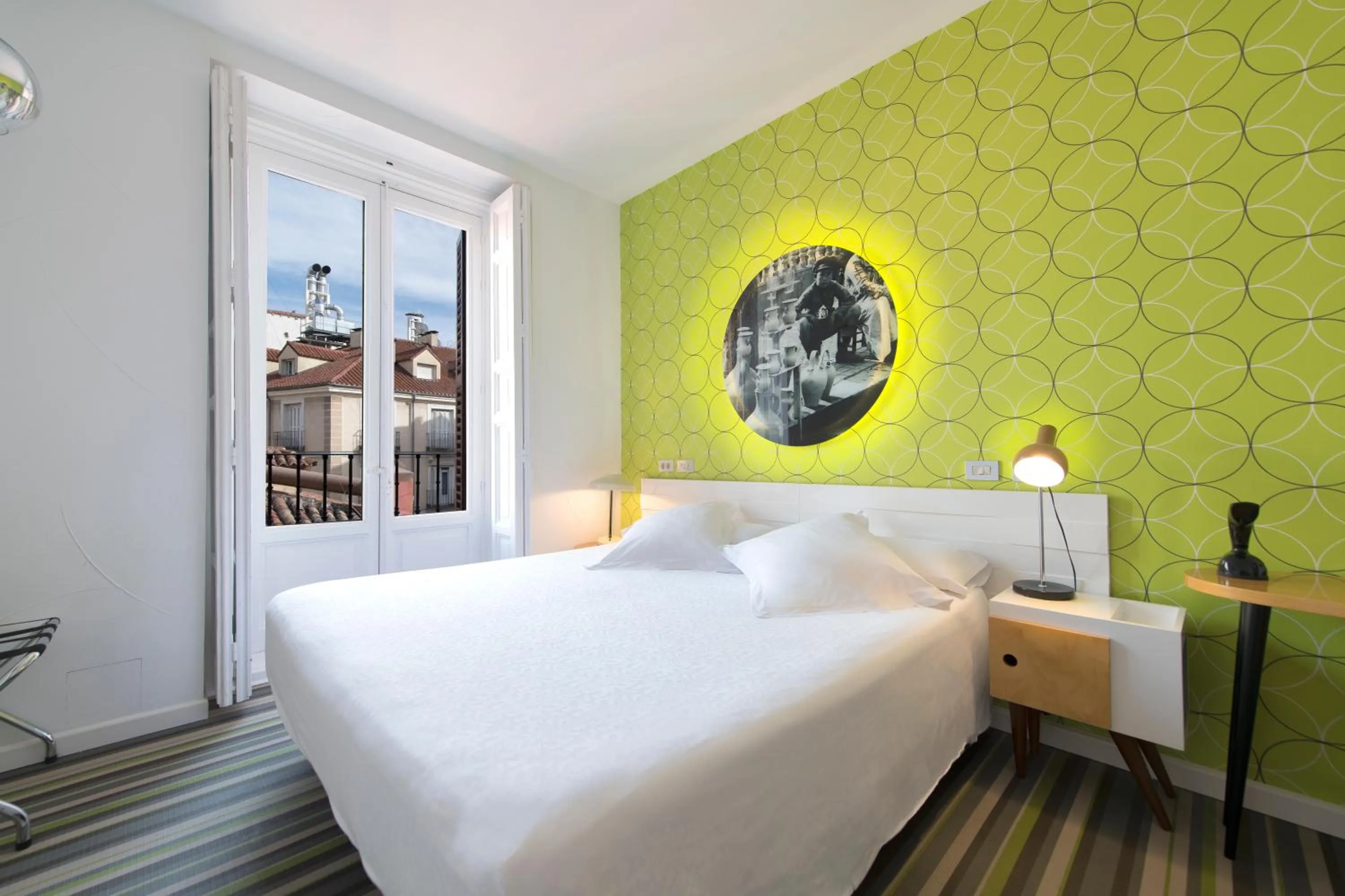 Bed in Posada del Dragón Boutique Hotel