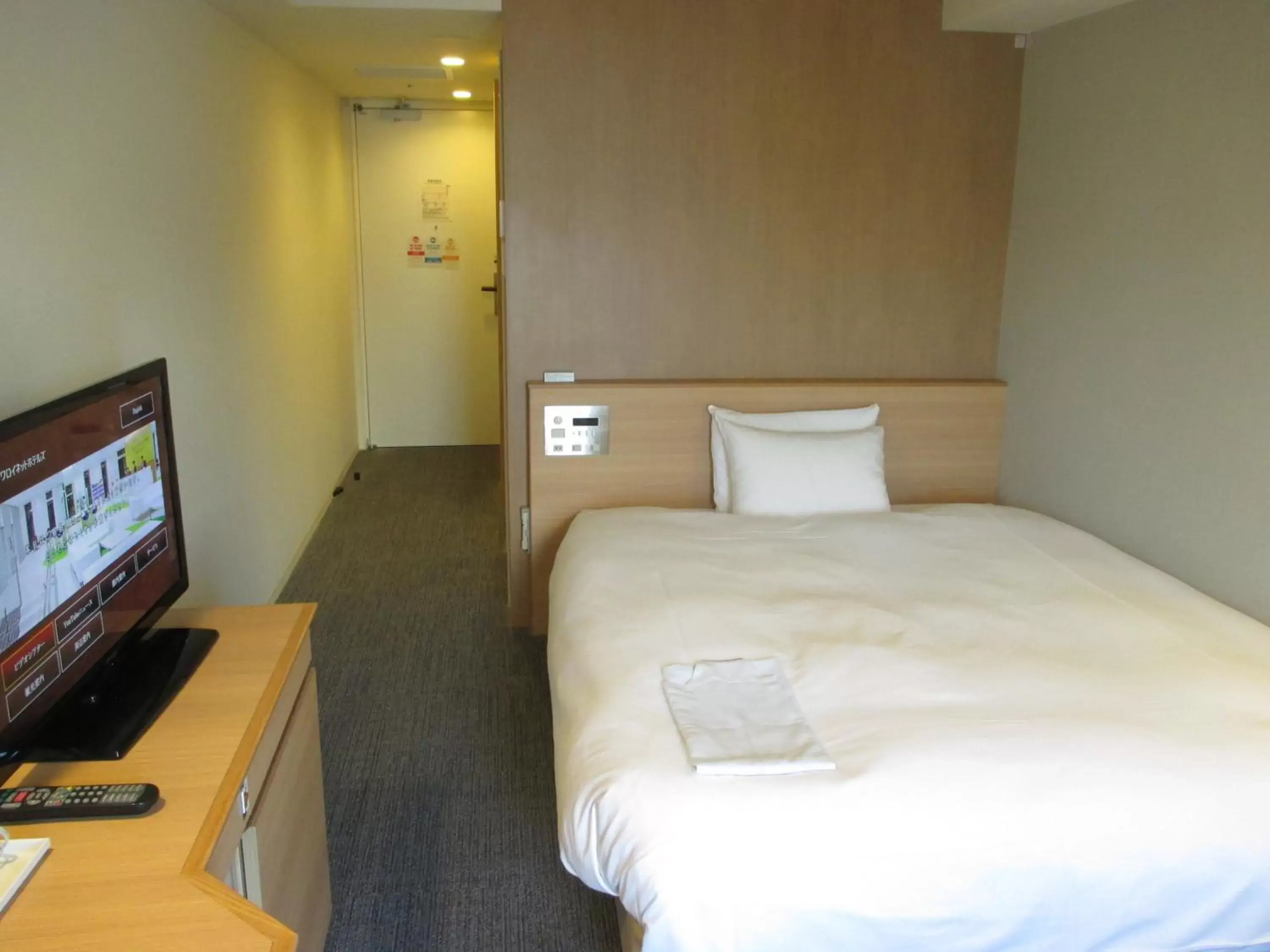 Bed in Daiwa Roynet Hotel Numazu