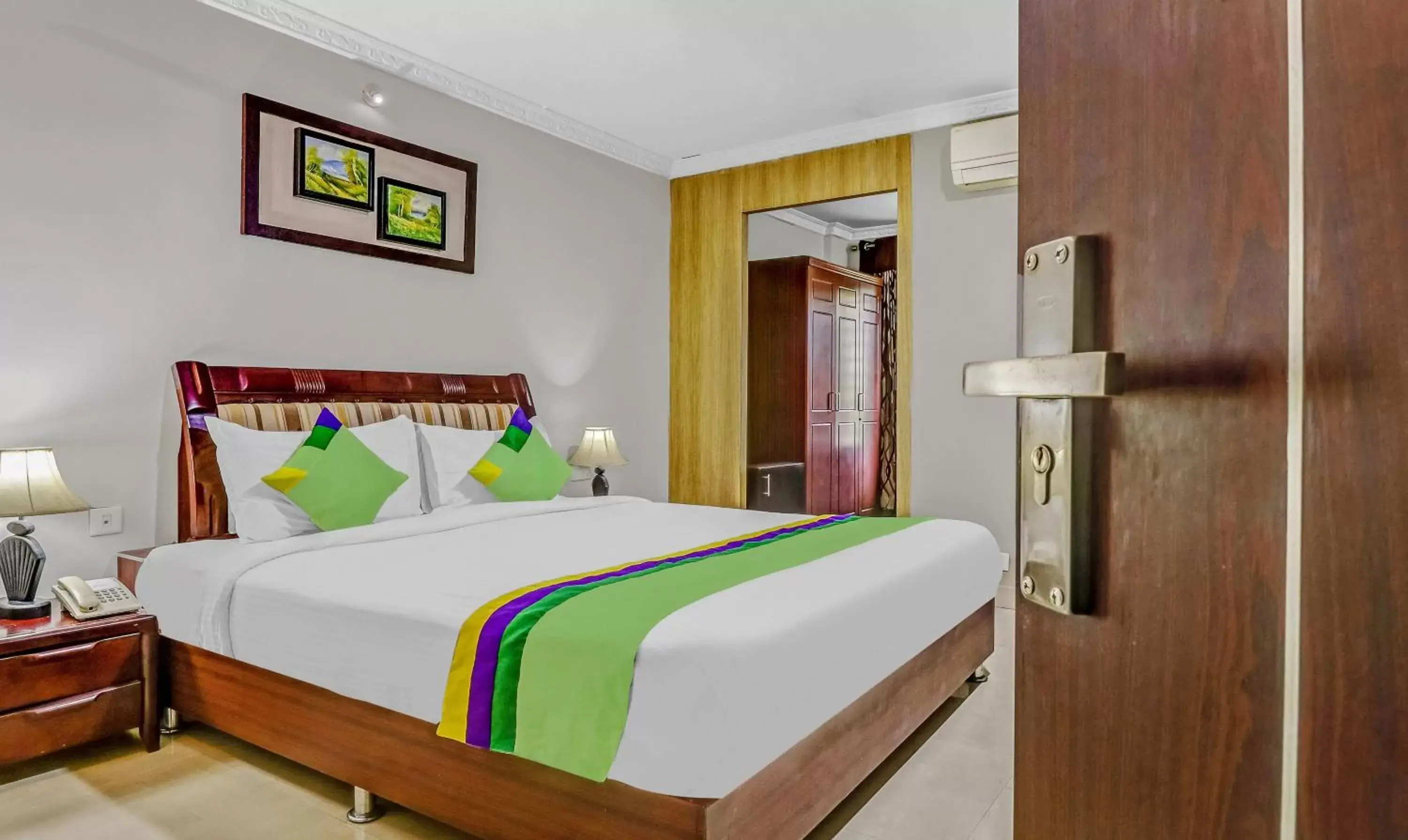 Bedroom, Bed in Treebo Trend Symphony Hotels And Resorts Angamally Bedroom, Bed in Treebo Trend Symphony Hotels And Resorts Angamally