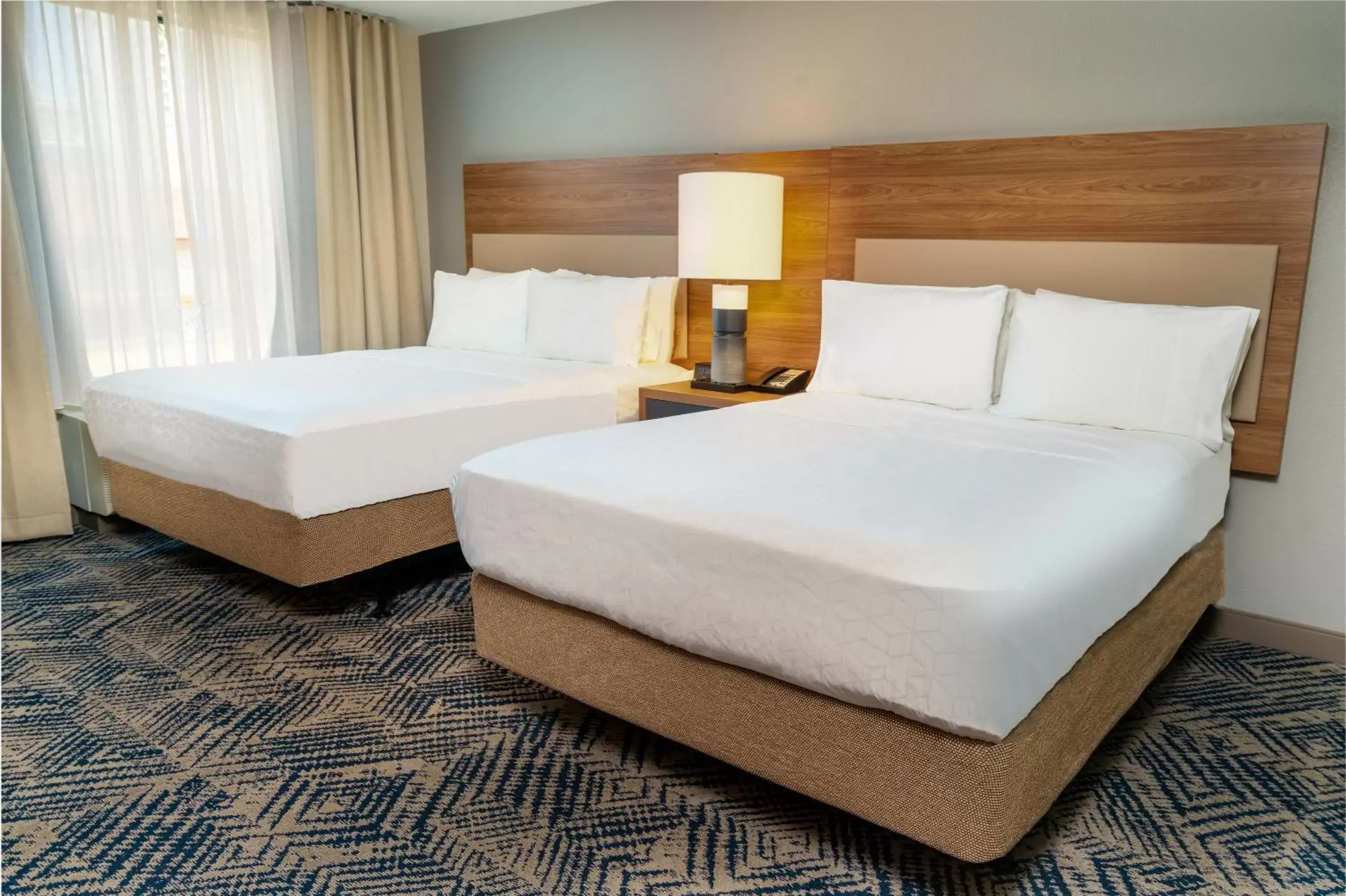 Bed in Candlewood Suites - Las Vegas - E Tropicana, an IHG Hotel