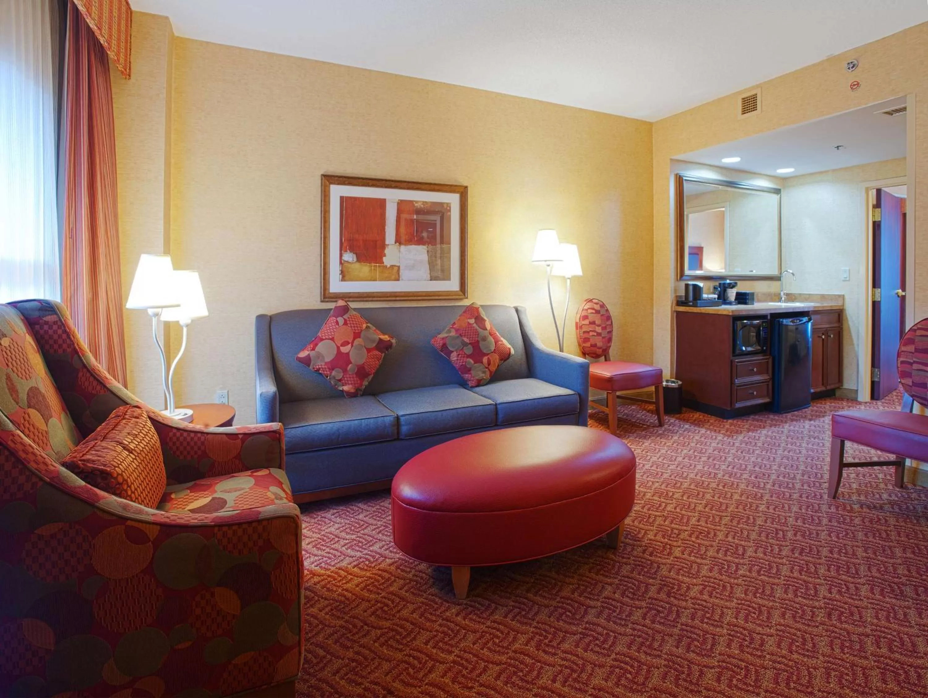 Living room in Embassy Suites by Hilton Charlotte Concord Golf Resort & Spa