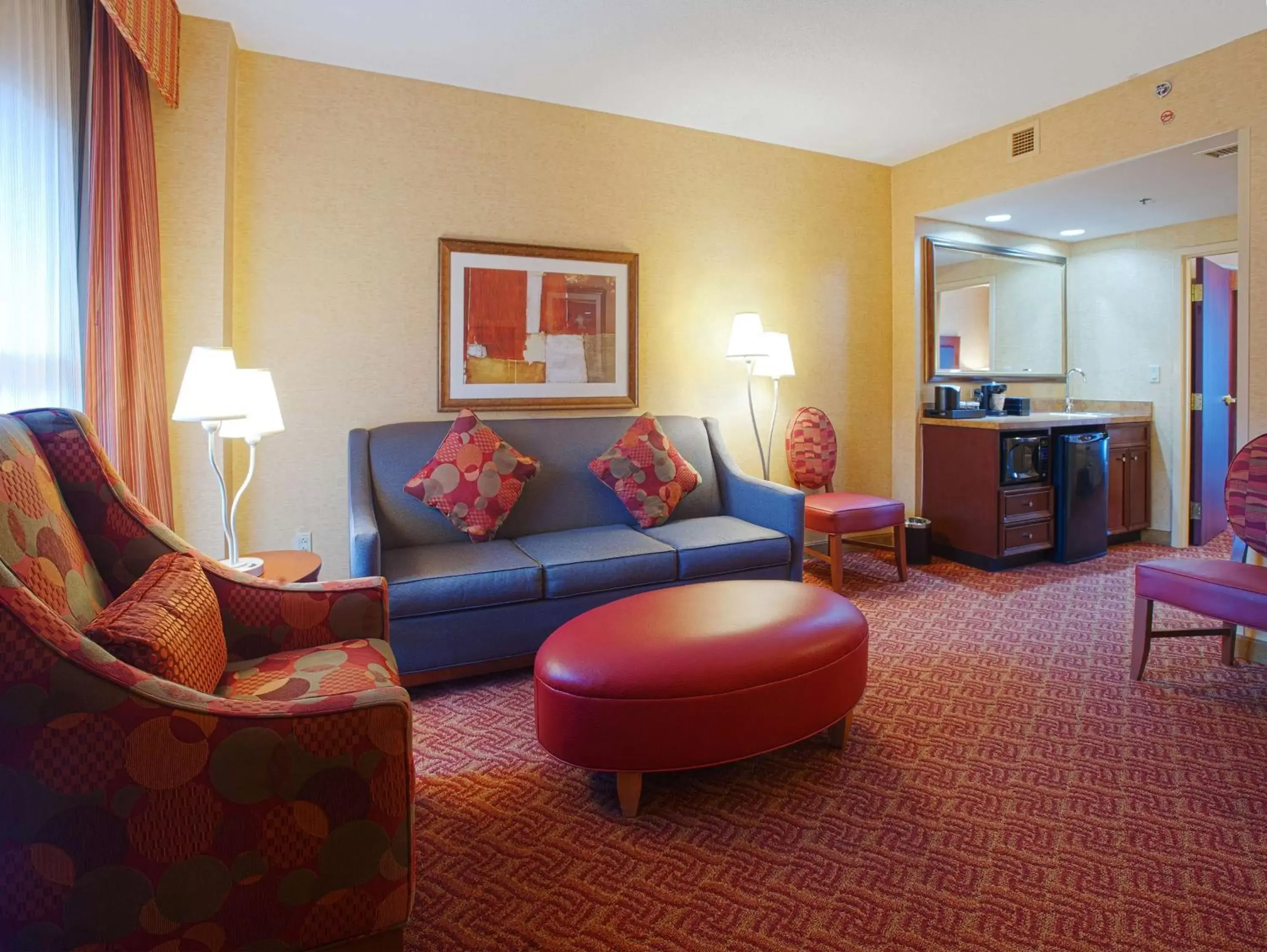 Living room, Seating Area in Embassy Suites by Hilton Charlotte Concord Golf Resort & Spa