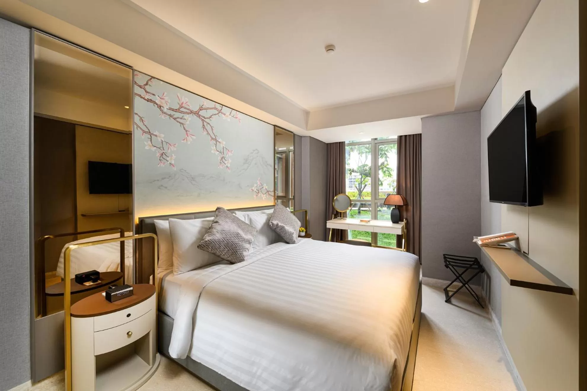 TV and multimedia, Bed in Oakwood Apartments PIK Jakarta
