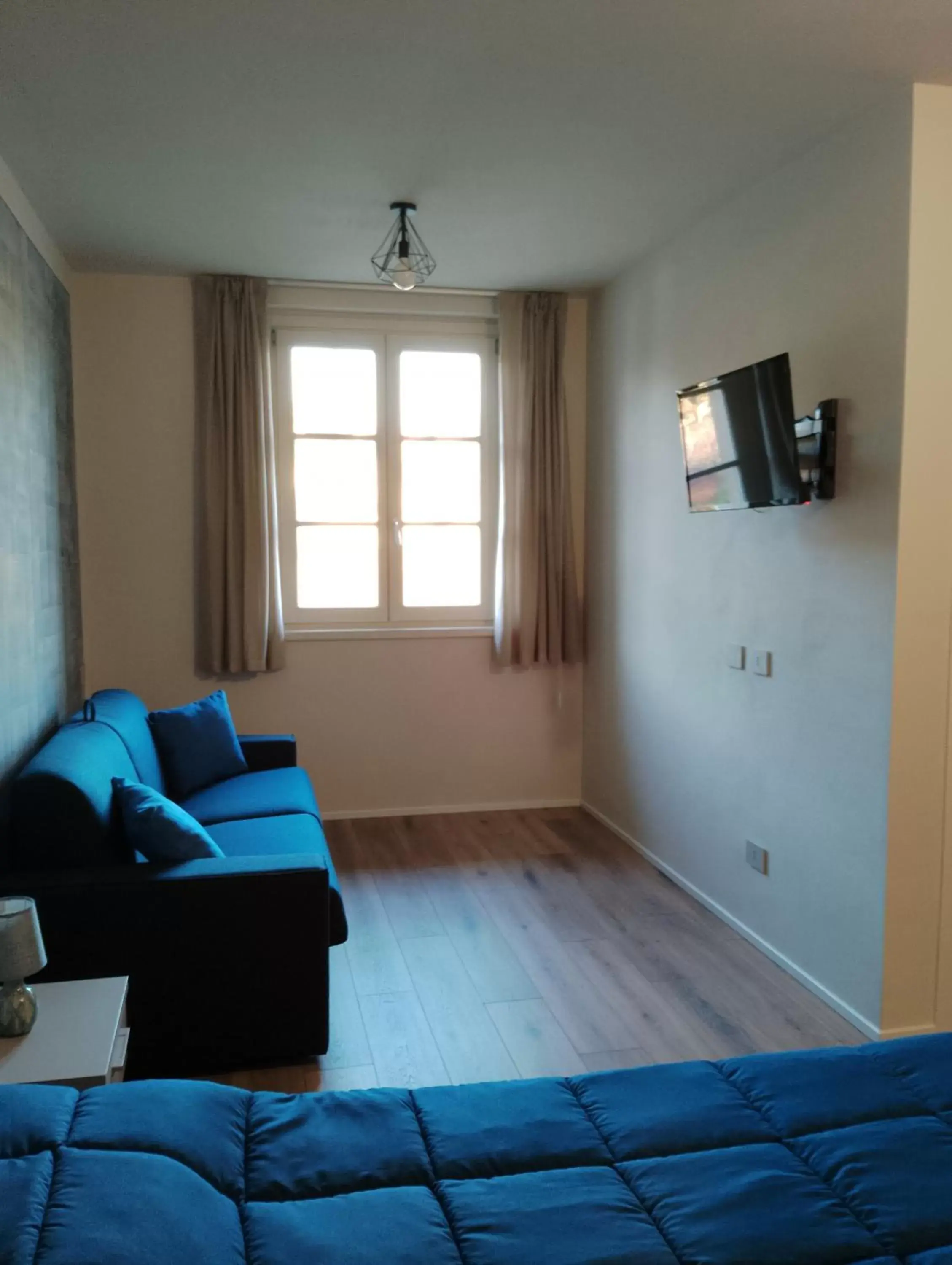 Bedroom, Seating Area in B&B LA VALLUNA