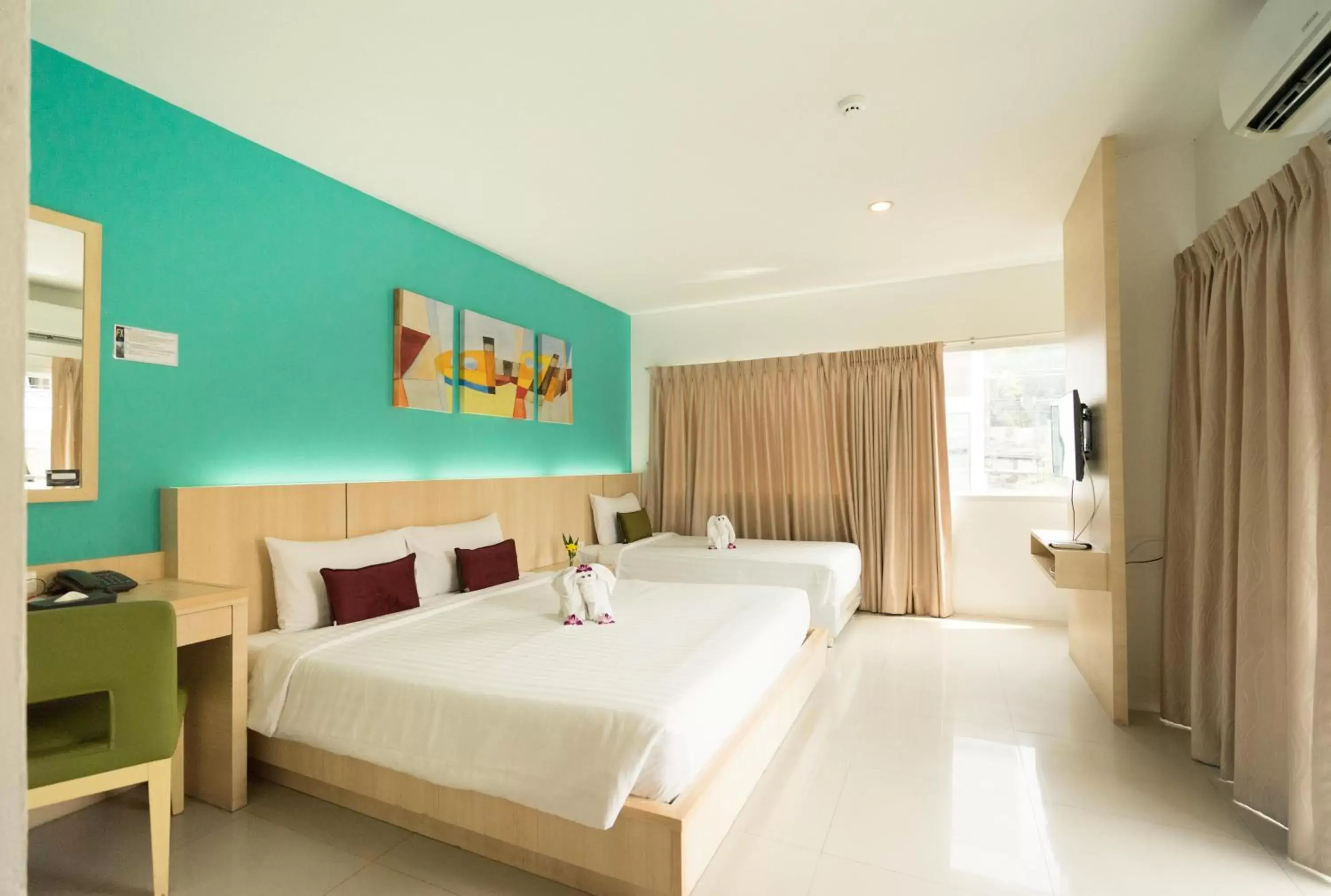 Bed in FX Hotel Pattaya