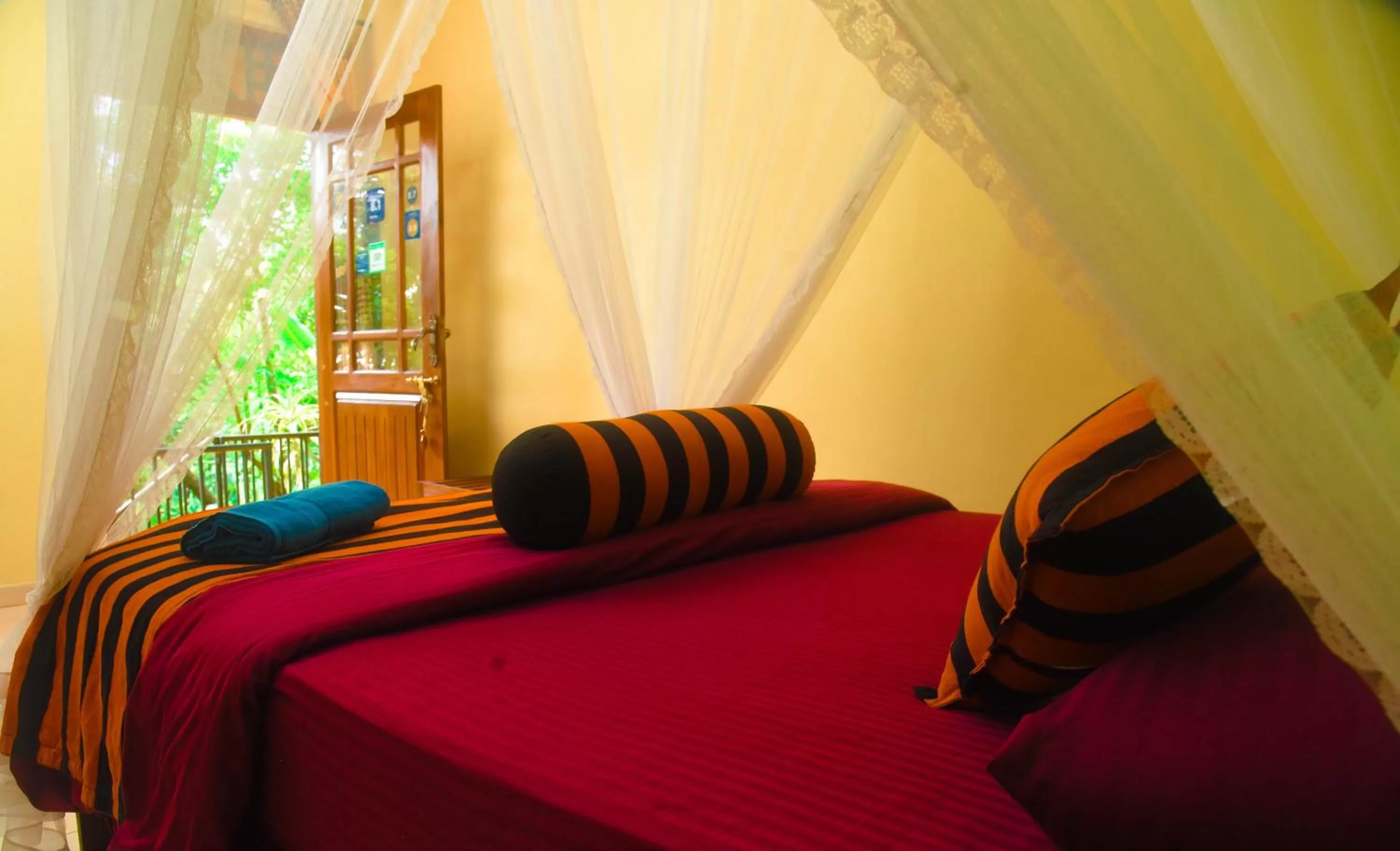 Bed in Madushanka Resort