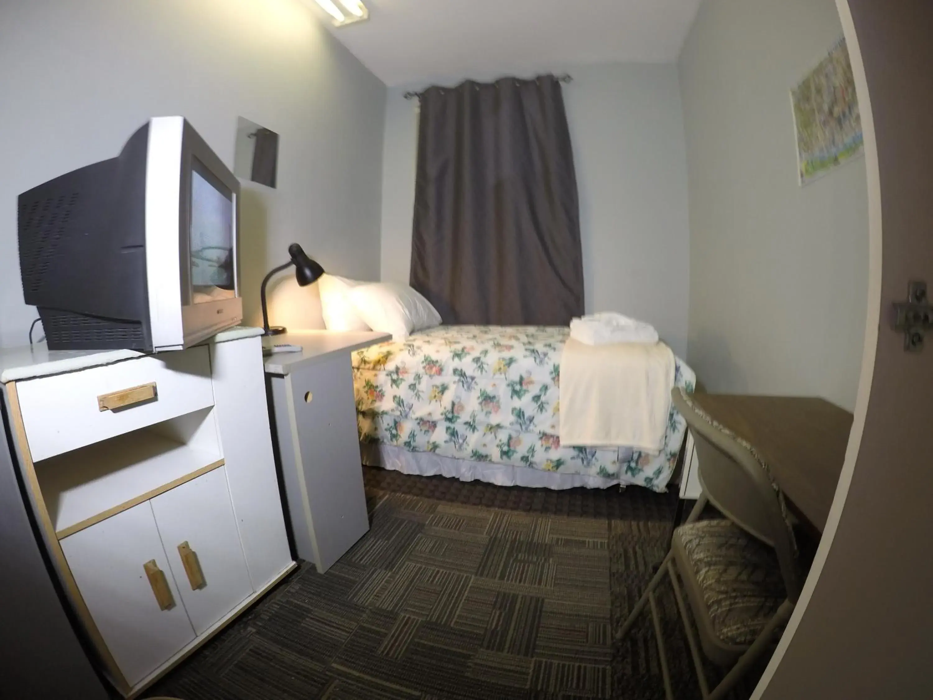 Photo of the whole room, Bed in Saint Lawrence Residences and Suites