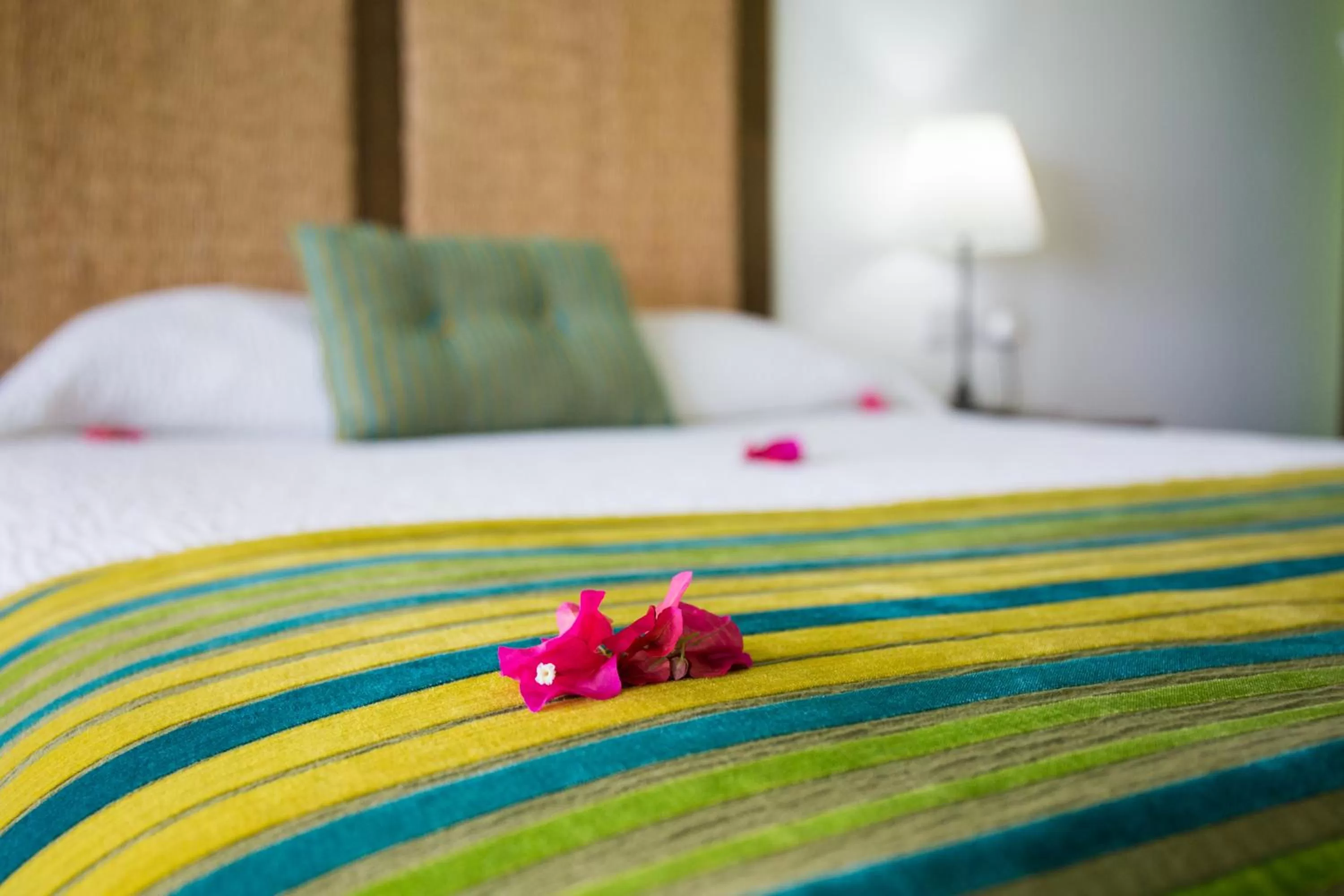 Bed in True Blue Bay Resort