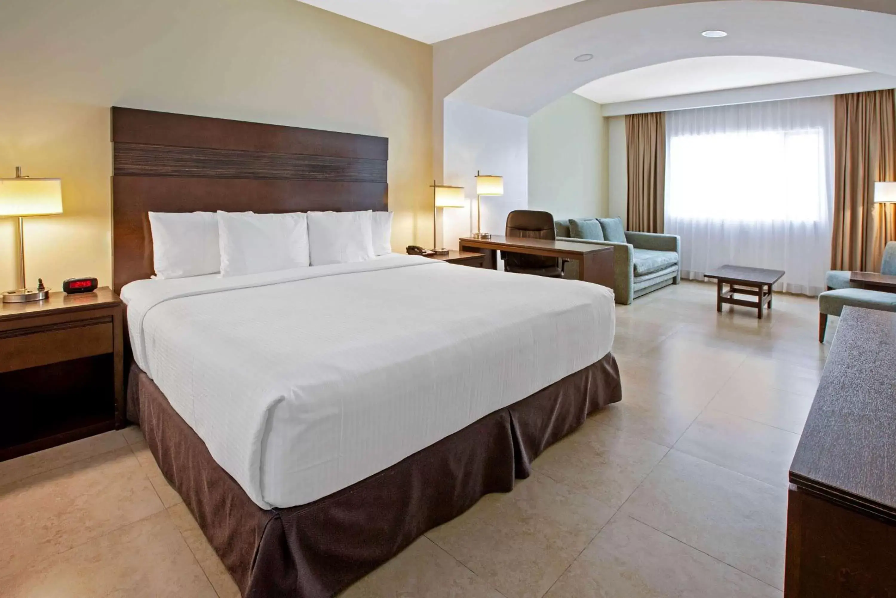 Photo of the whole room, Bed in Wyndham Garden Cancun Downtown