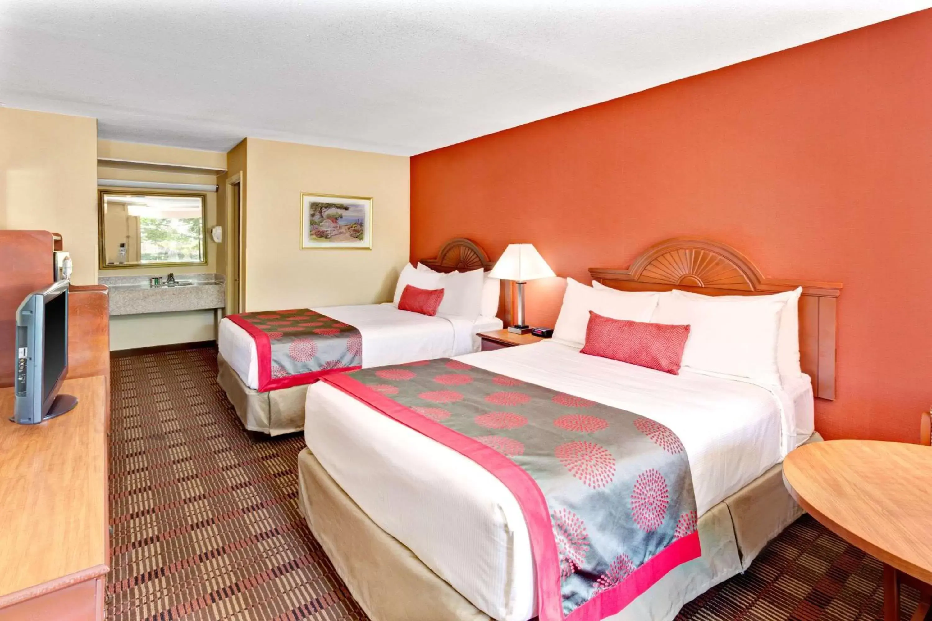 Photo of the whole room, Bed in Ramada by Wyndham Baltimore West