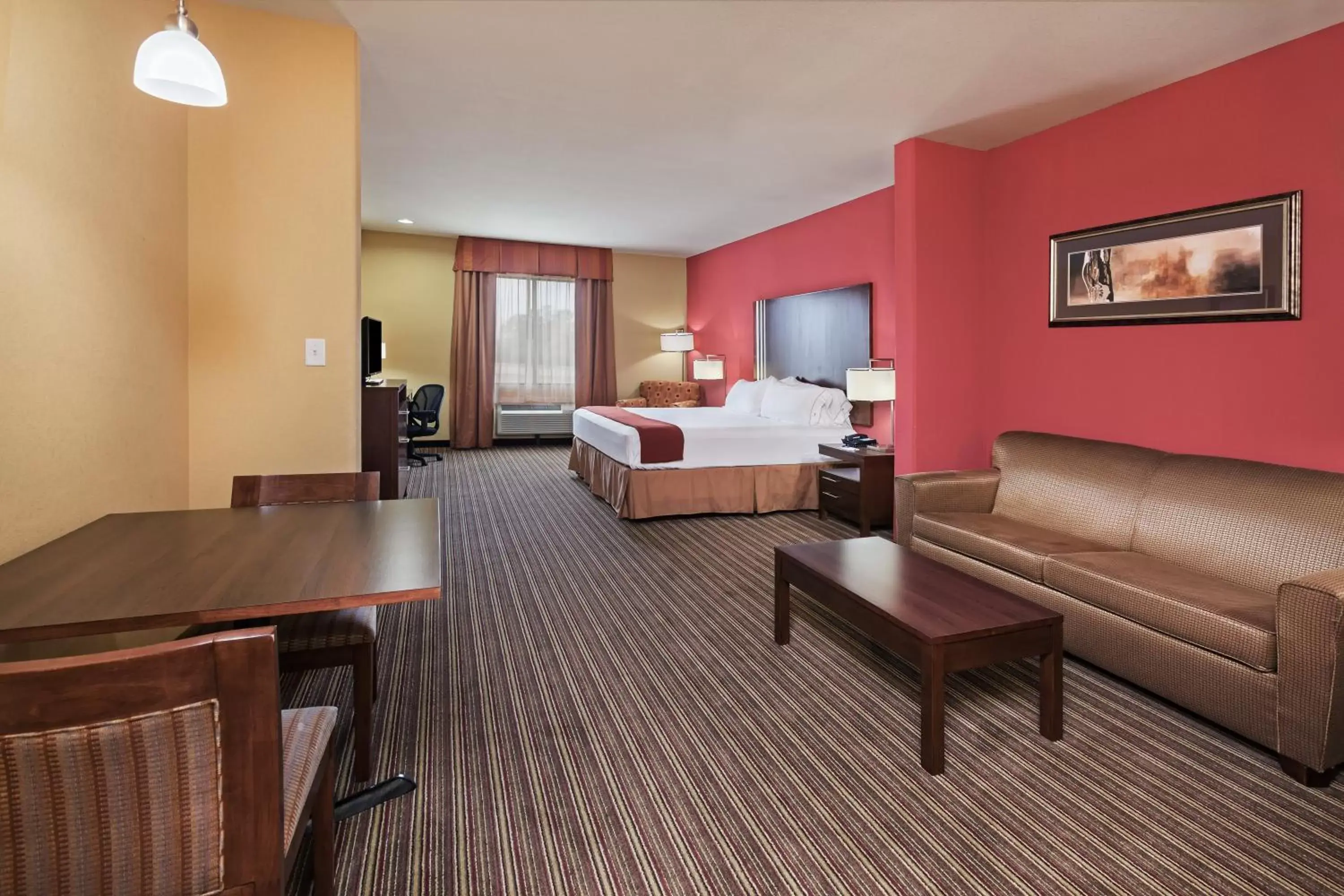 Bedroom in Holiday Inn Express & Suites Cleveland, an IHG Hotel