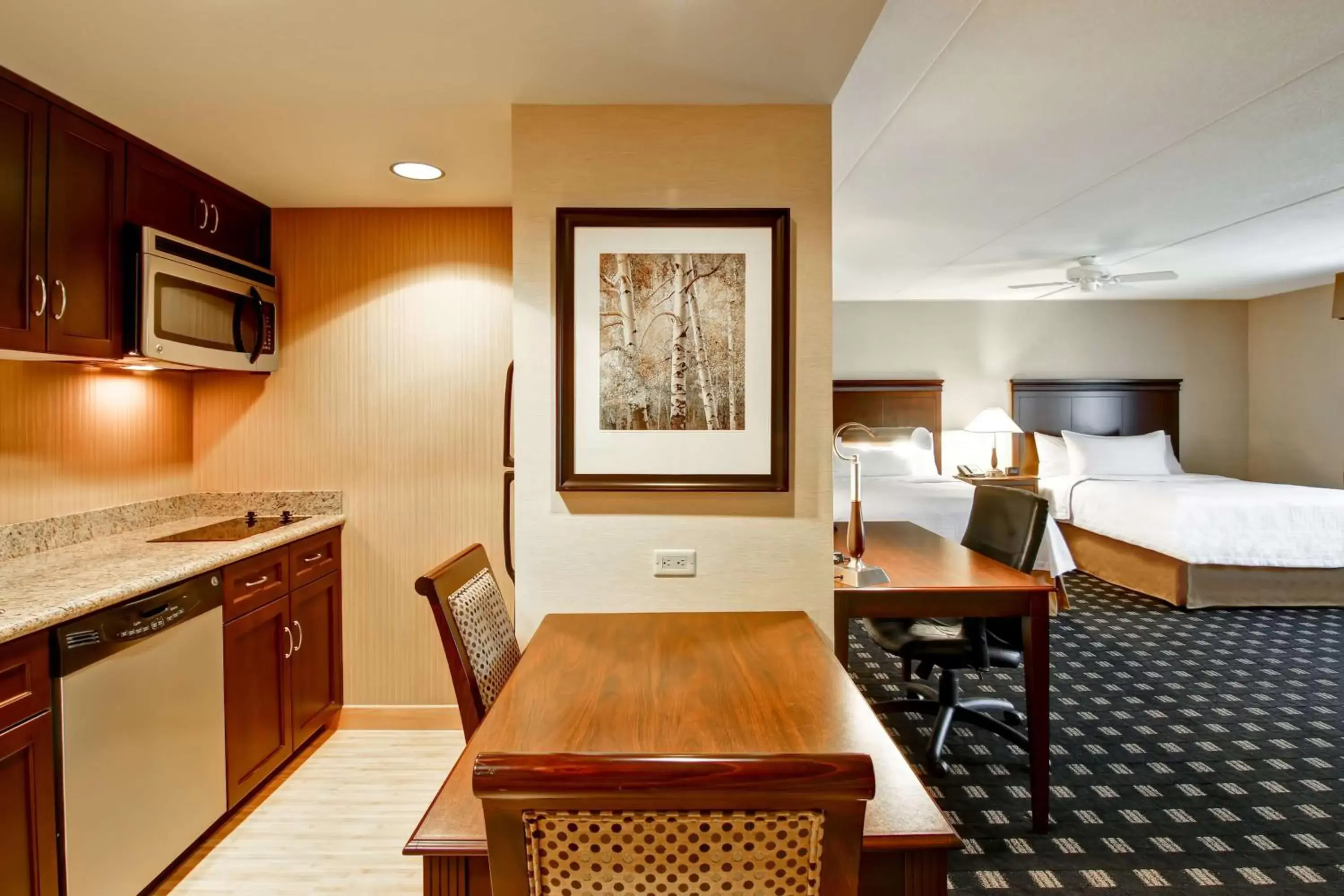 Bedroom, Kitchen/Kitchenette in Homewood Suites by Hilton Toronto Airport Corporate Centre