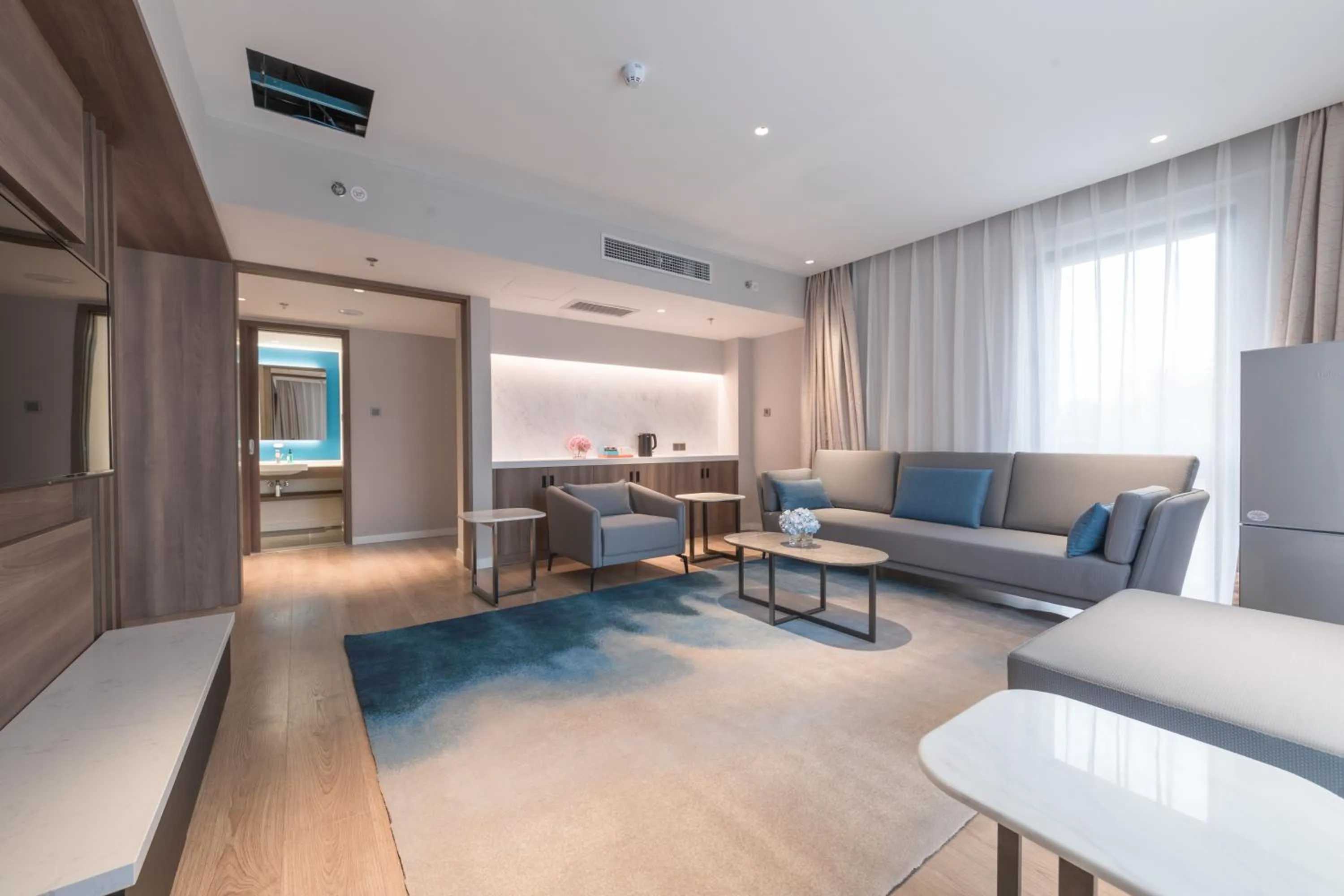 Living room in Holiday Inn Express Beijing Shijingshan Lakeview by IHG