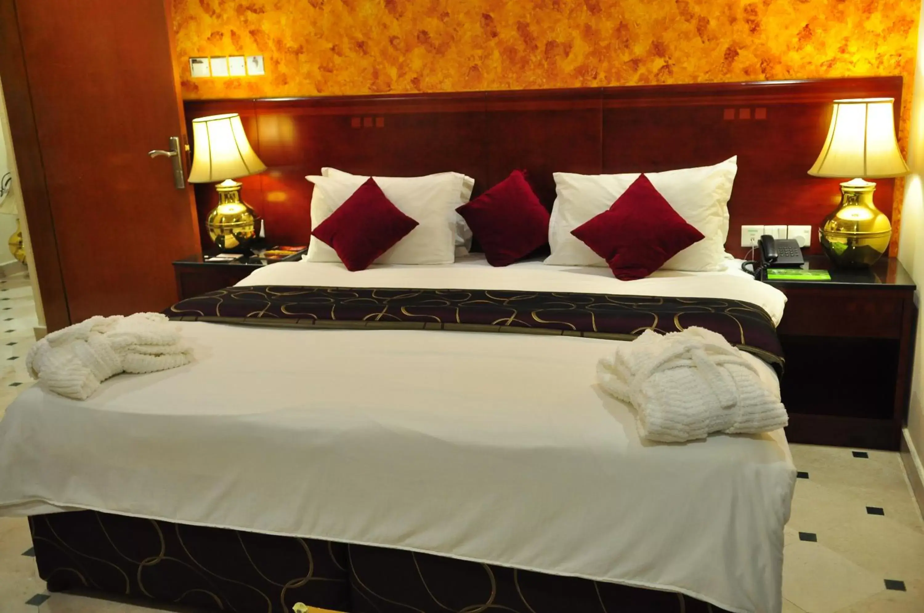 Bed, Room Photo in Al Bahjah Hotel
