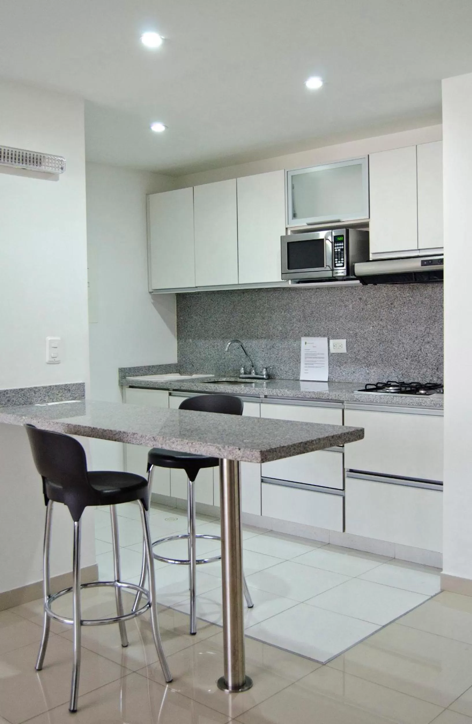 Kitchen or kitchenette in 122 Plaza Apartahotel