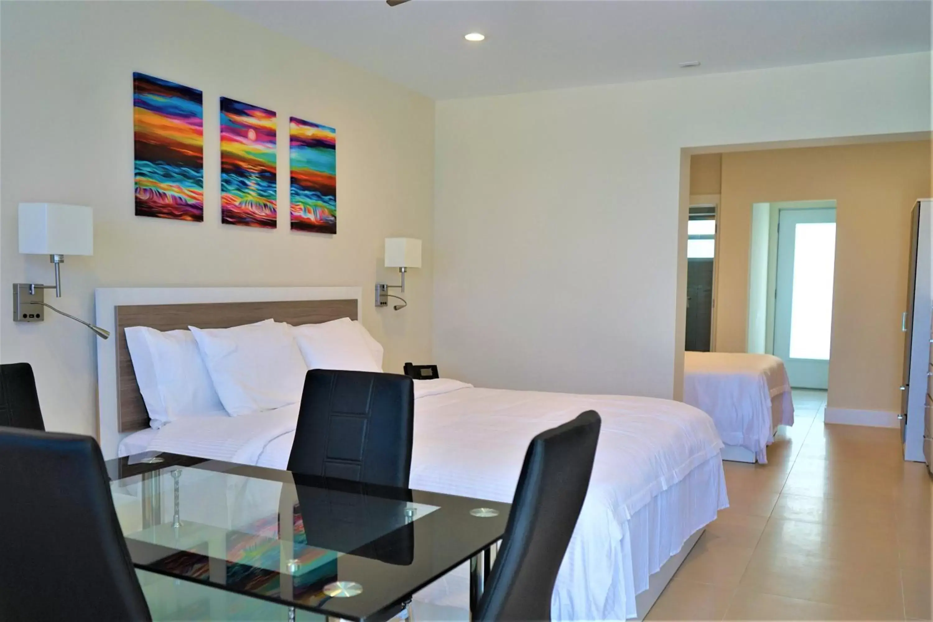 Living room, Bed in Diane Oceanfront Suites Living room, Bed in Diane Oceanfront Suites