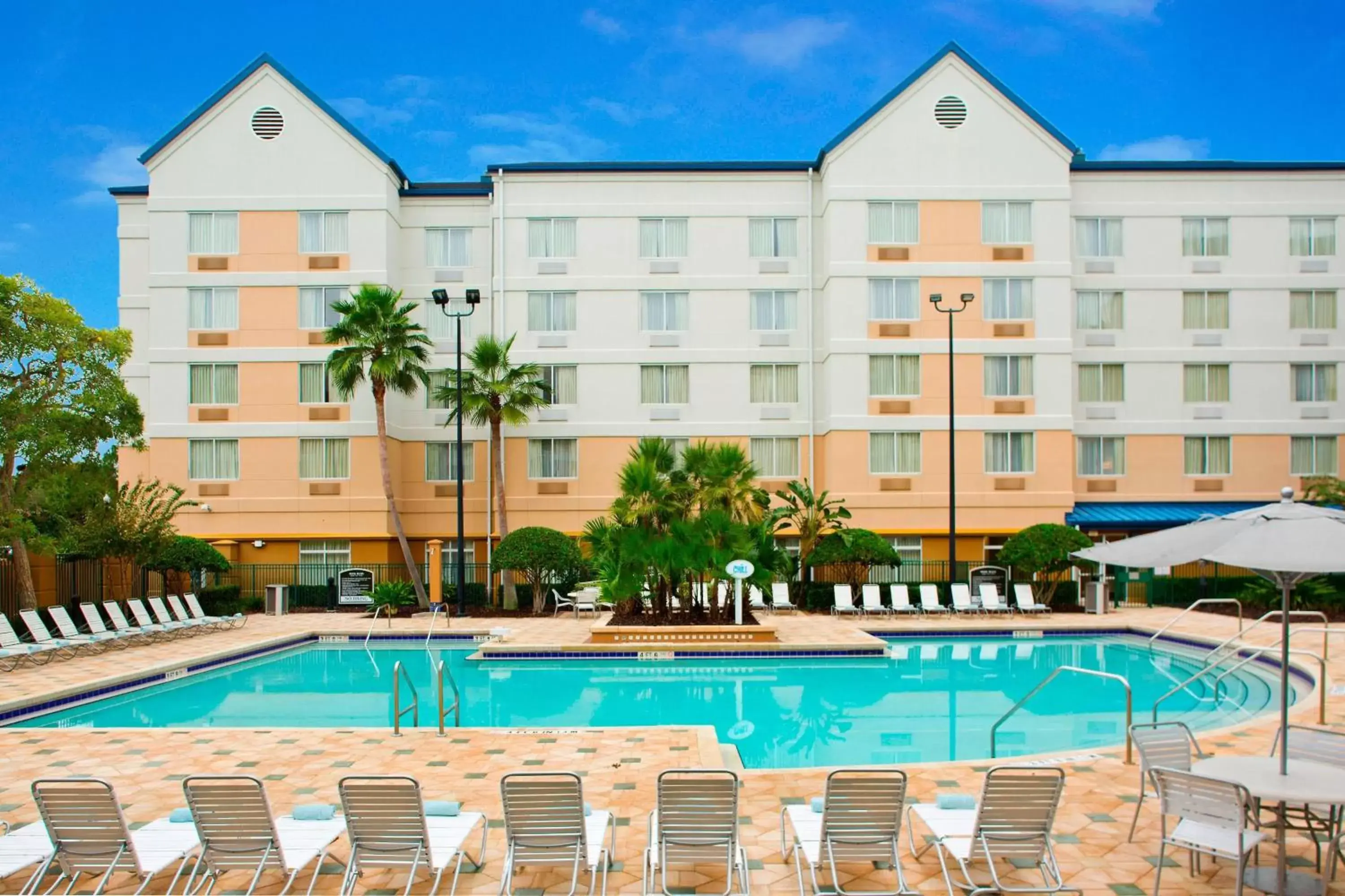 Swimming pool, Property Building in Fairfield Inn & Suites by Marriott Orlando Lake Buena Vista in the Marriott Village