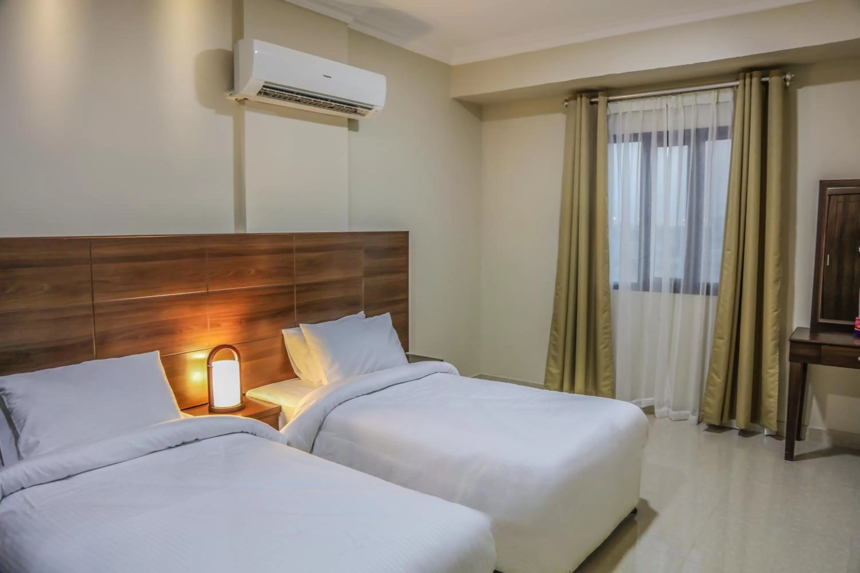 Bed in Barka Hotel Apartment
