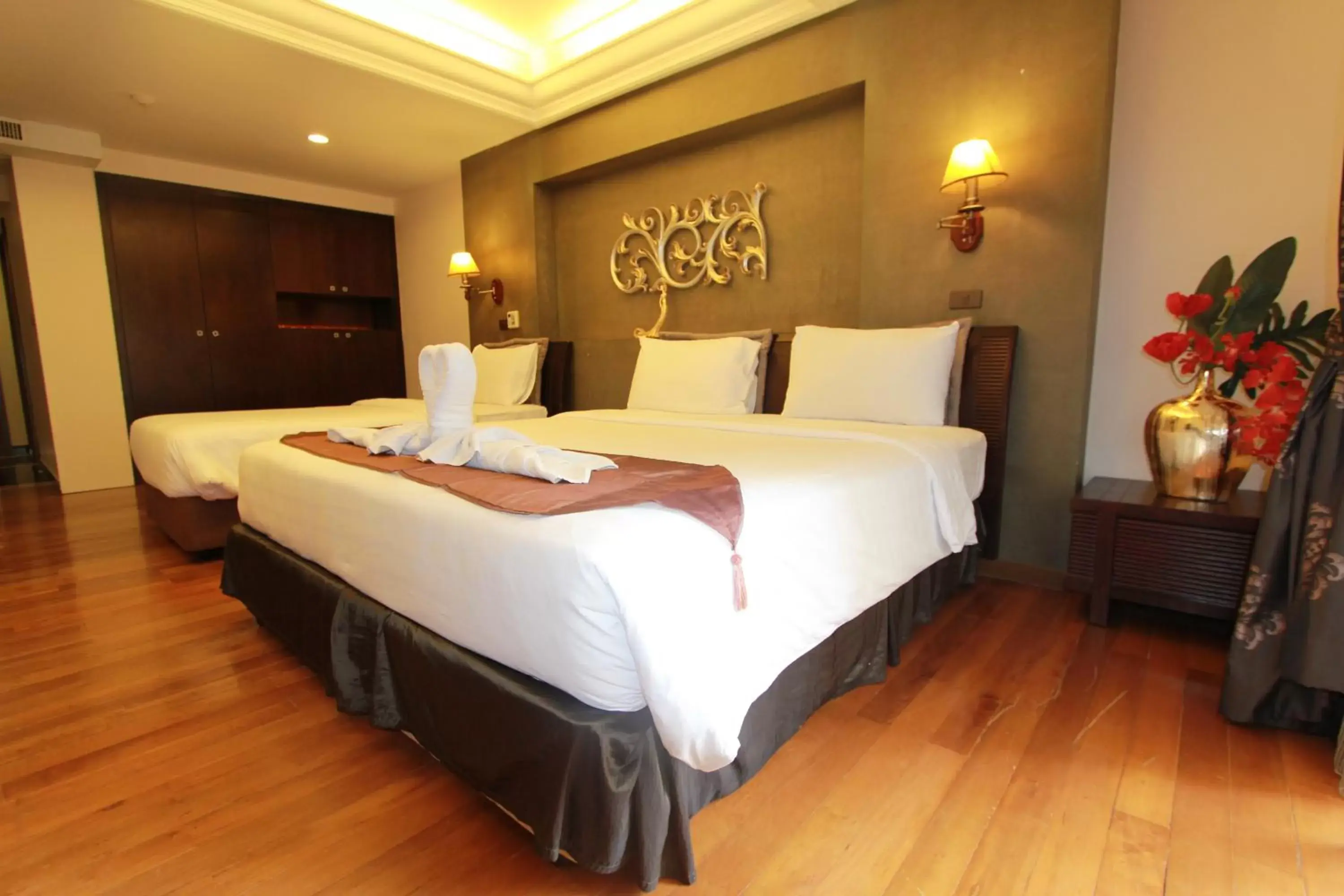 Deluxe Triple Room in LK Mantra Pura Resort