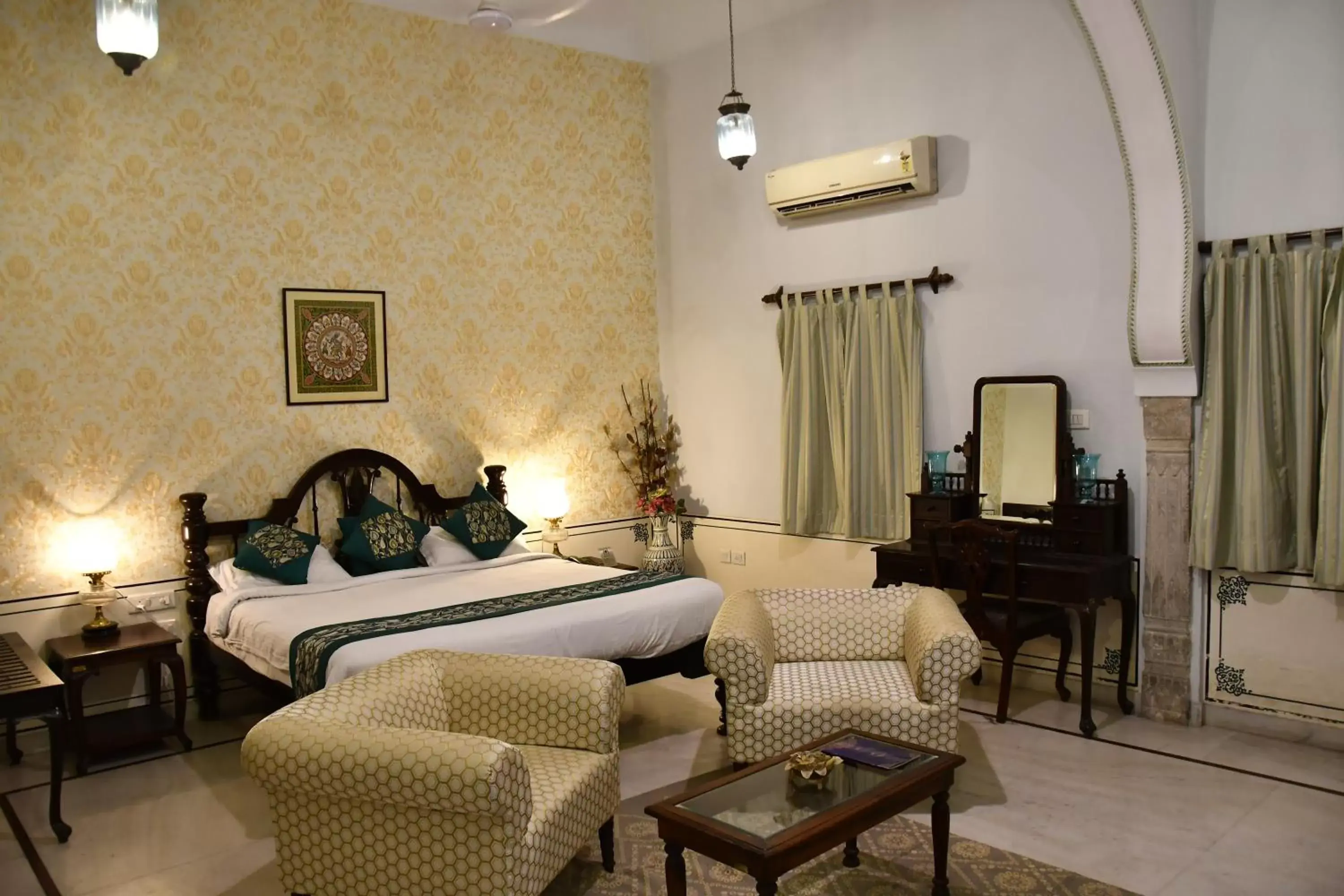 Bed, Seating Area in Khandela Haveli - a Boutique Heritage Hotel