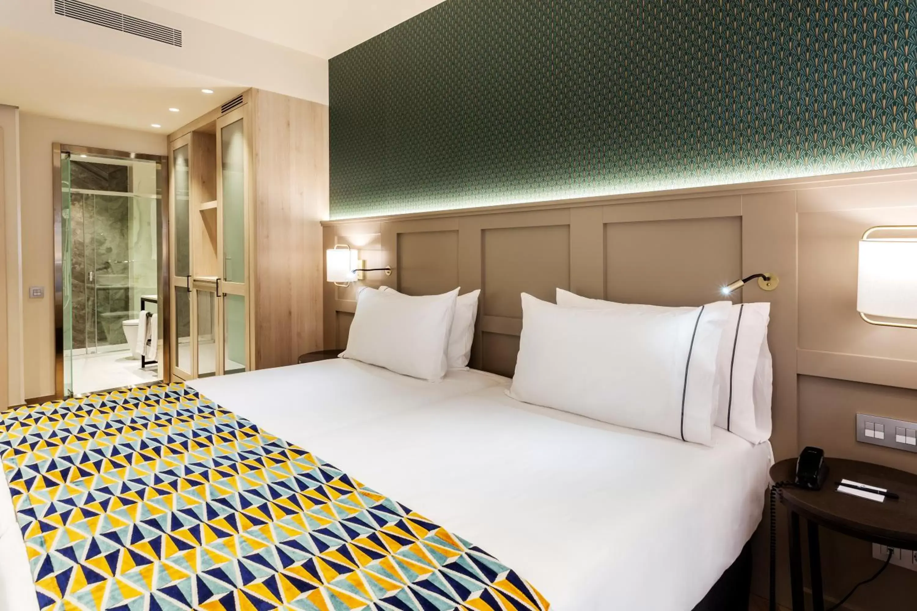 Photo of the whole room, Bed in Eurostars Puerta Real