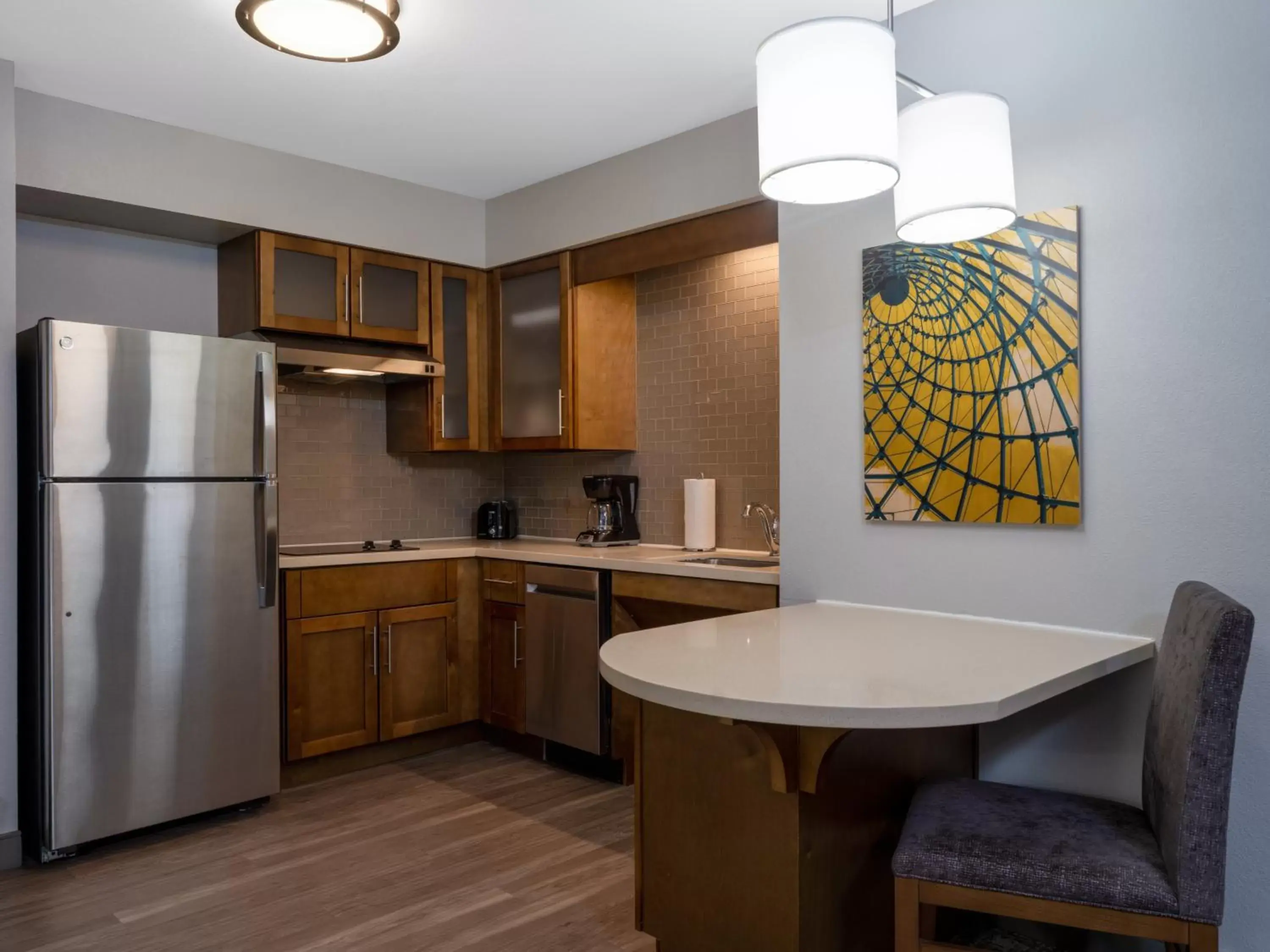 Photo of the whole room, Kitchen/Kitchenette in Staybridge Suites - Sioux City Southeast, an IHG Hotel