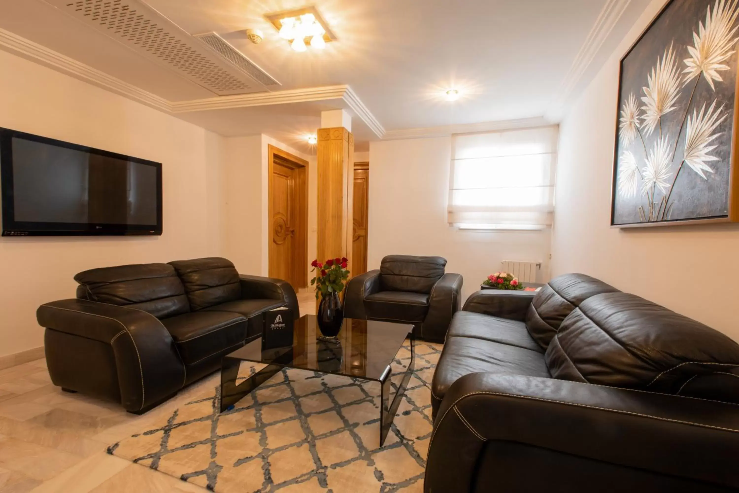 Communal lounge/ TV room, Seating Area in The Penthouse Suites Hotel