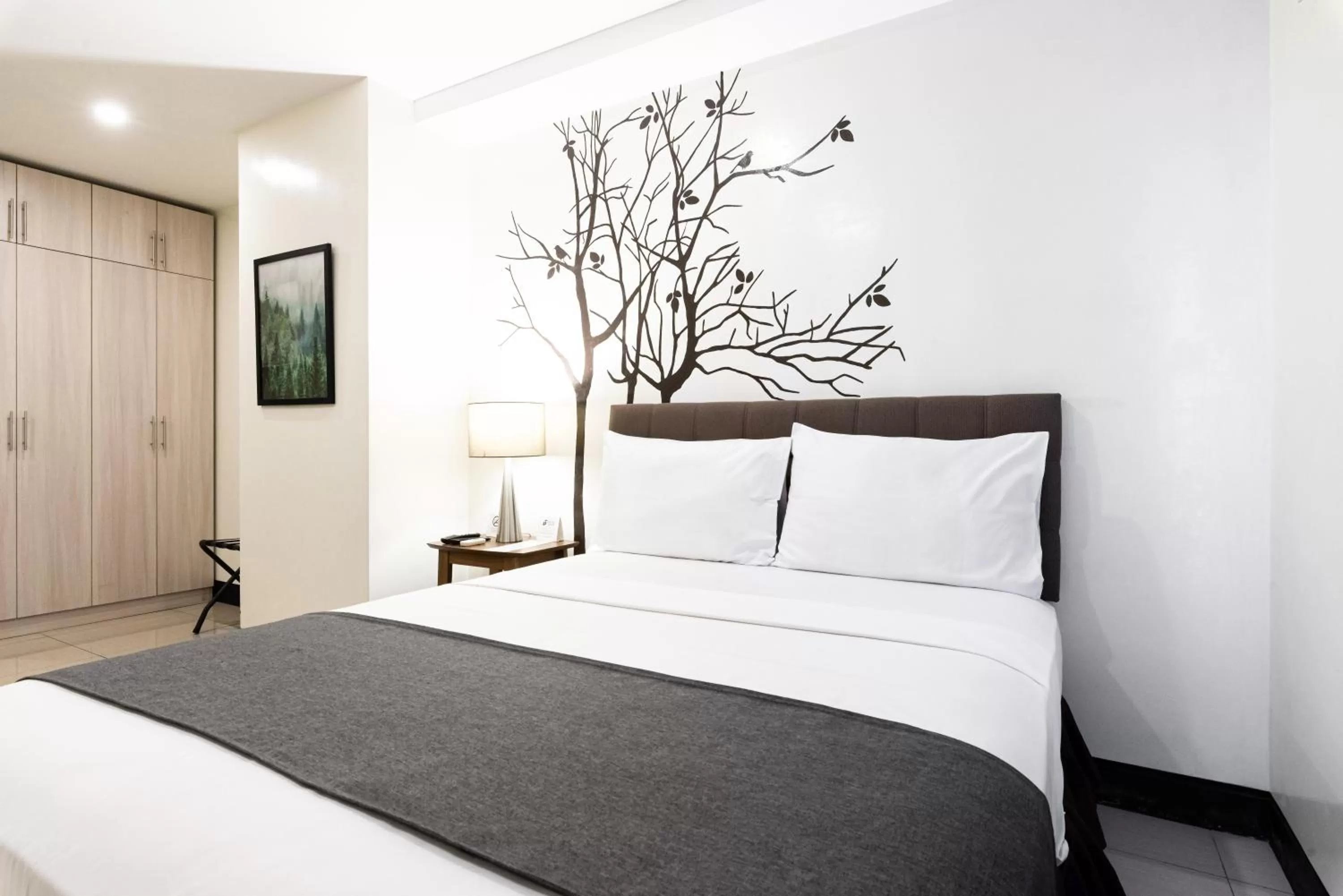 Bedroom, Bed in Artemis Place Makati Hotel