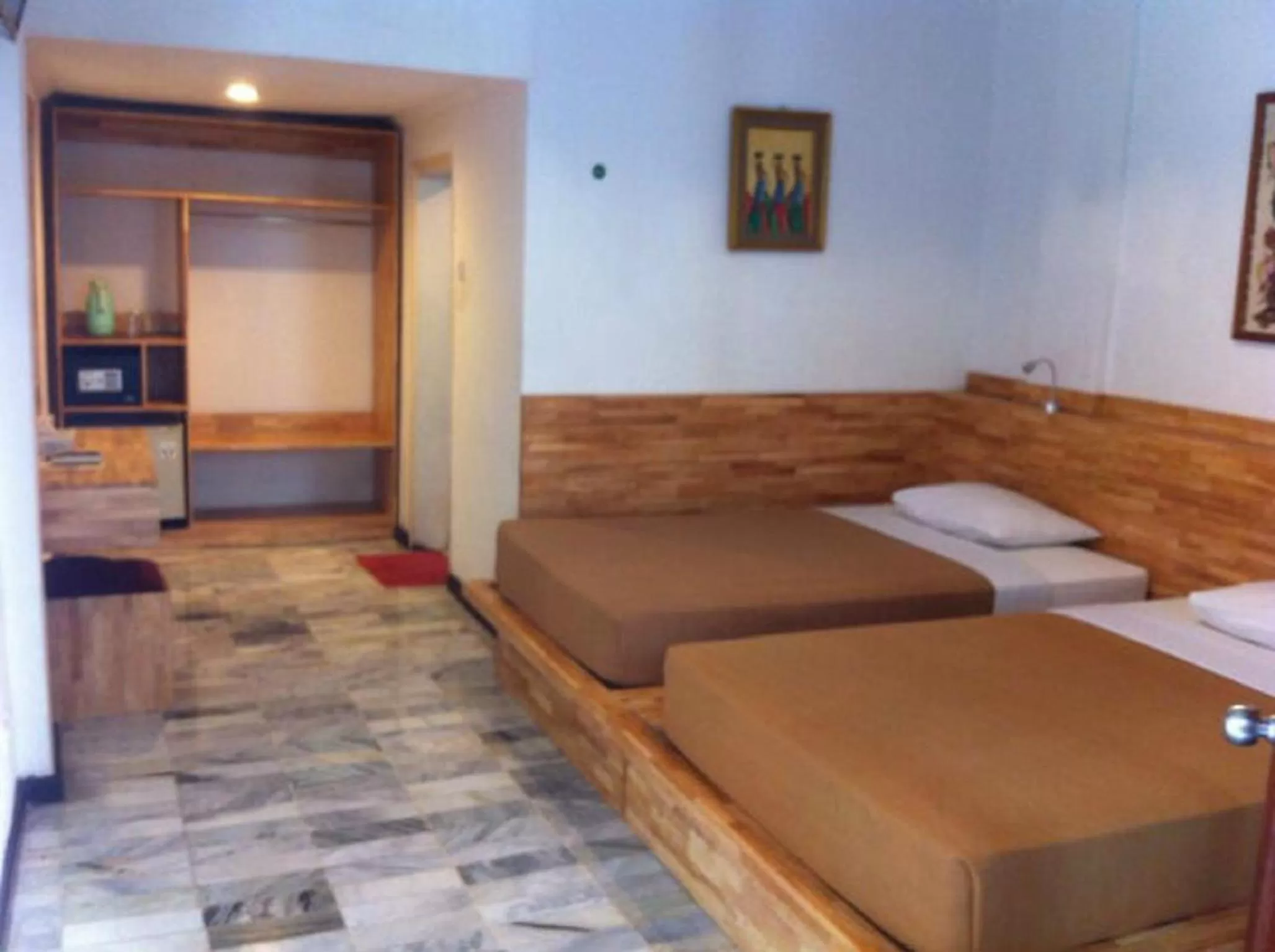 Photo of the whole room, Bed in Hotel Karthi Kuta