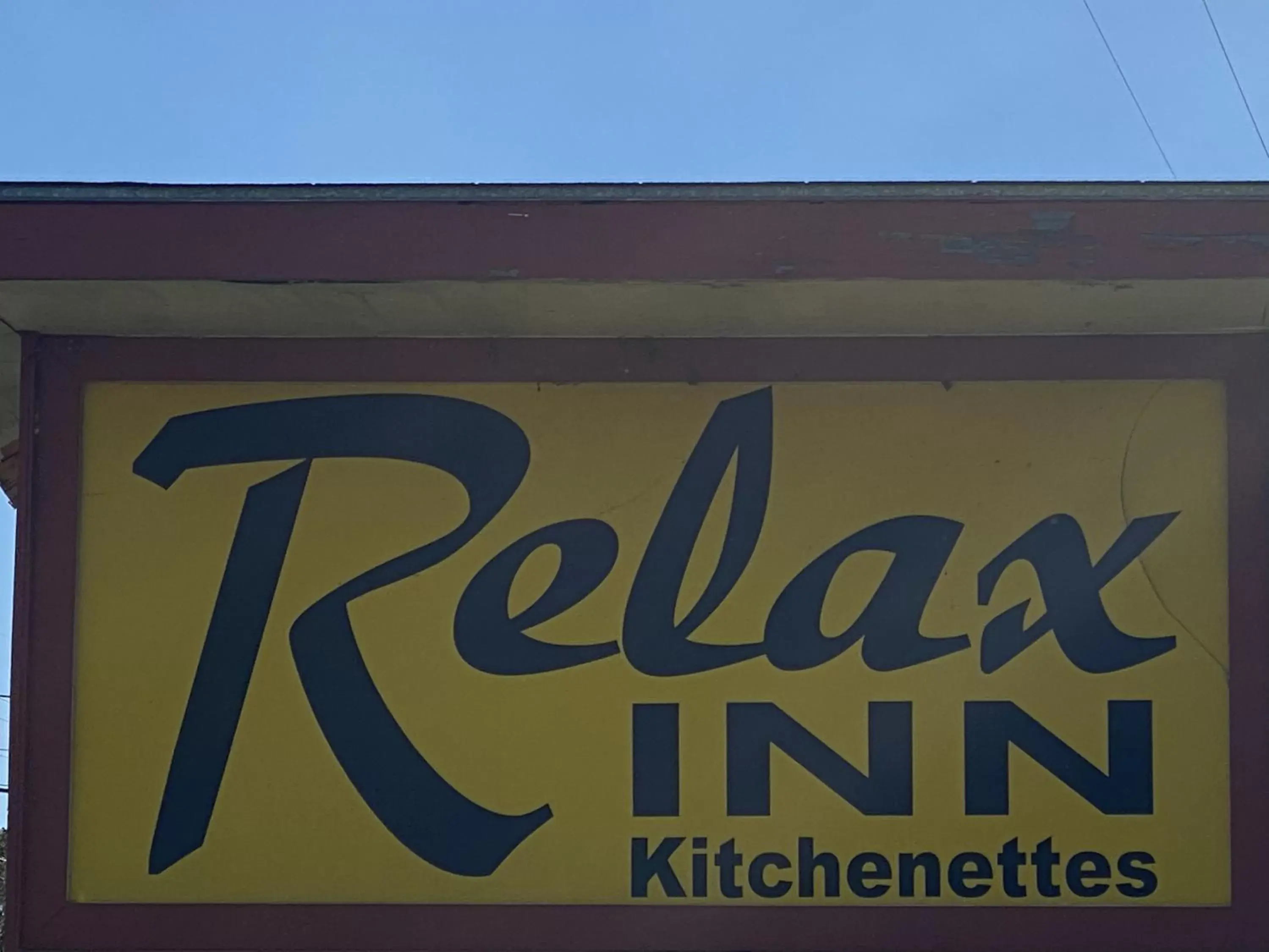 Property logo or sign in Relax Inn-Plaquemine