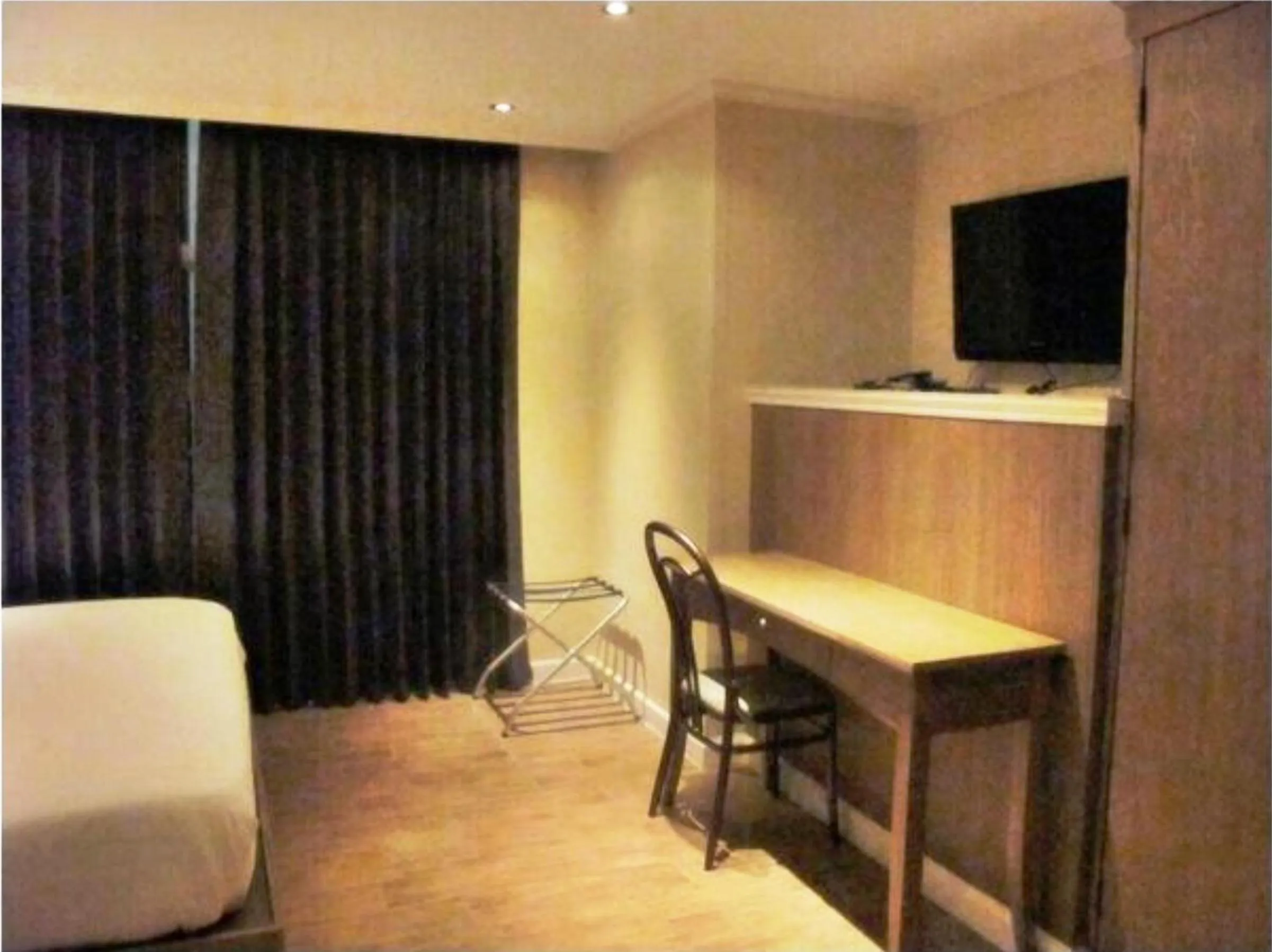 Bedroom in Bourbon St. Boutique Hotel