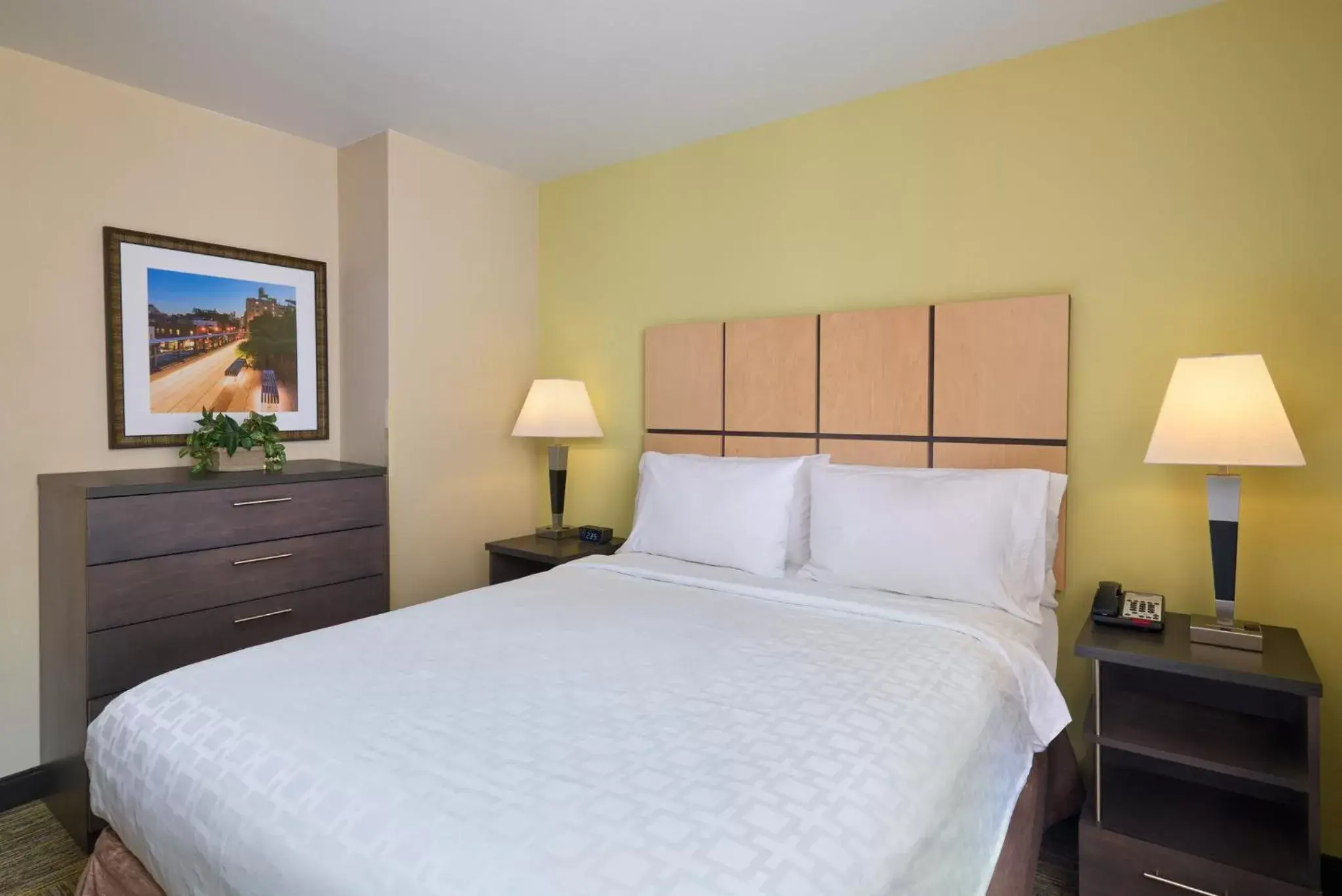 Photo of the whole room, Bed in Candlewood Suites NYC -Times Square, an IHG Hotel