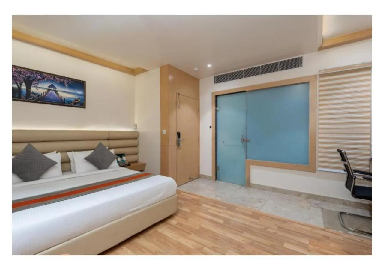 Bed in Hotel Arihant By DLS Hotels