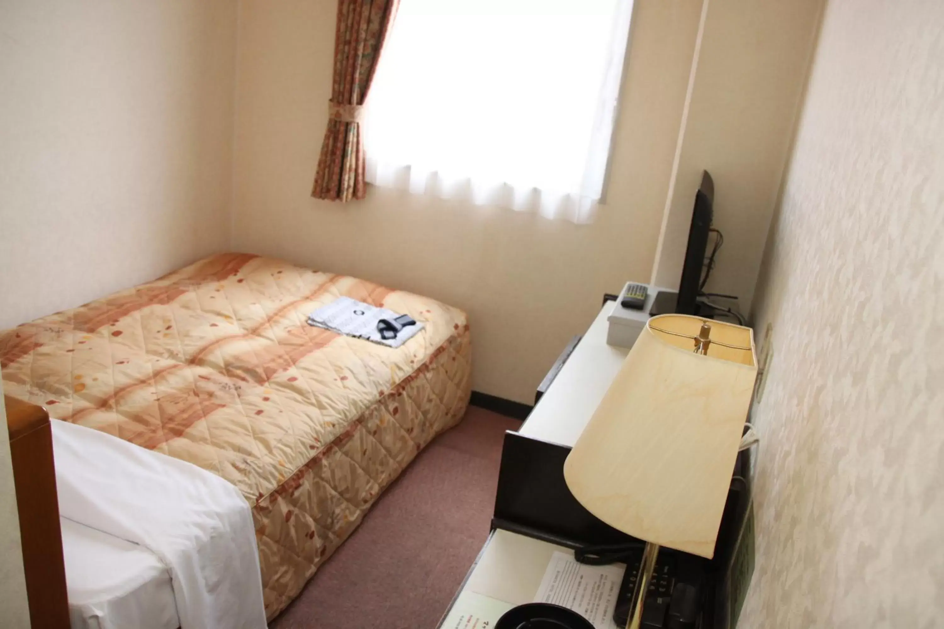 Photo of the whole room, Bed in Business Hotel Nissei