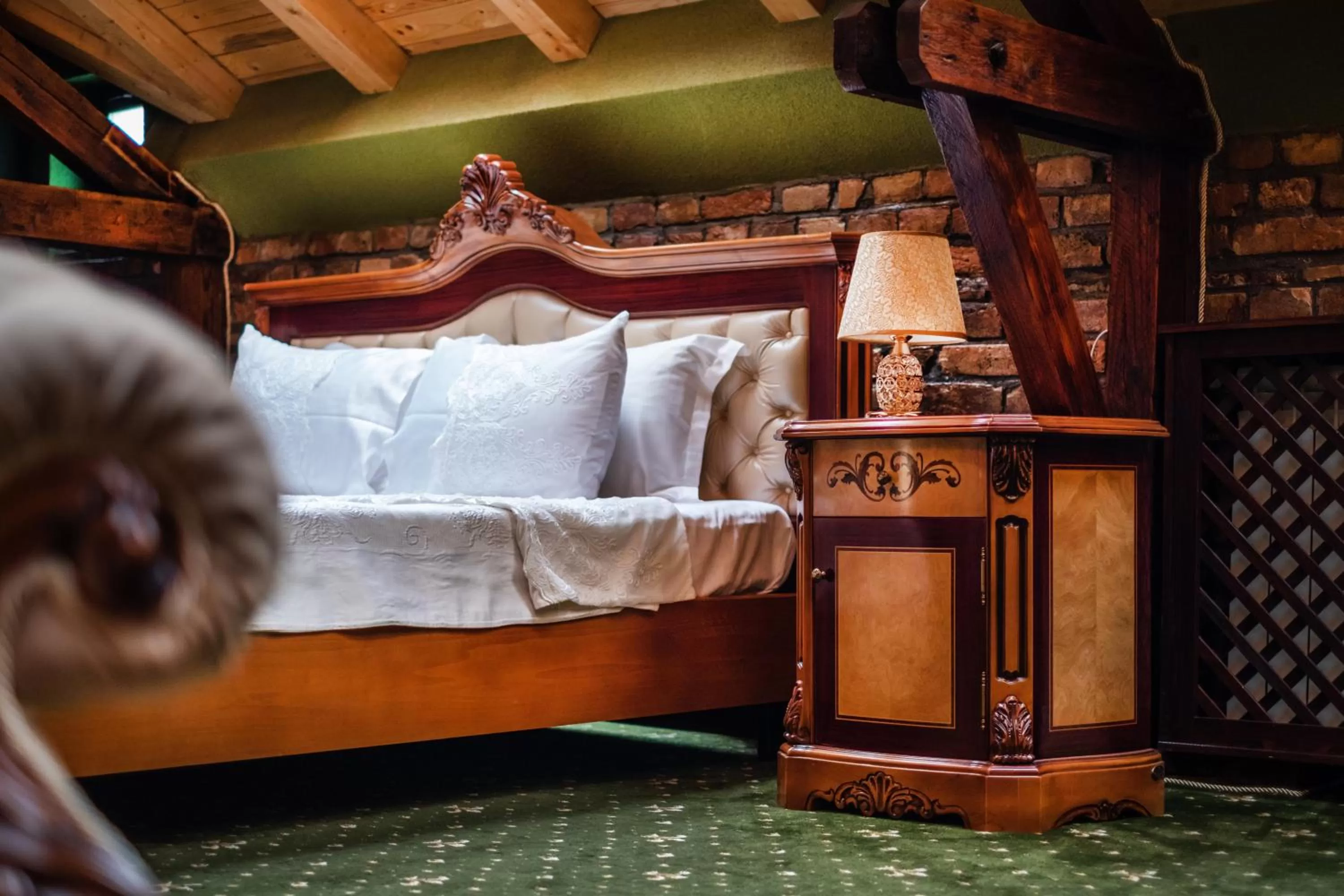 Decorative detail, Bed in JMR Royal -Luxury Rooms & Private Sauna