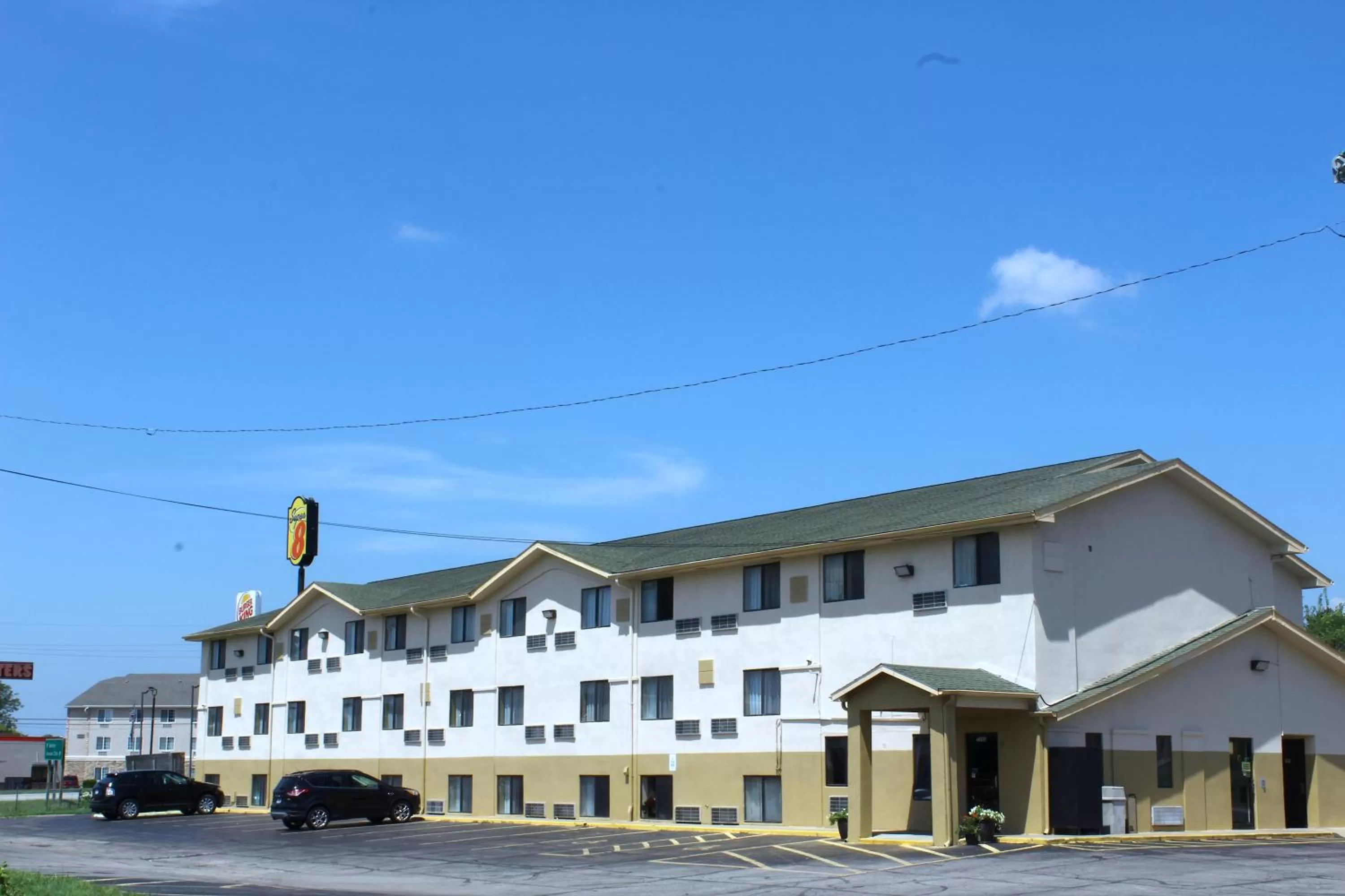 Property building in Super 8 by Wyndham Topeka/Wanamaker RD/I-70