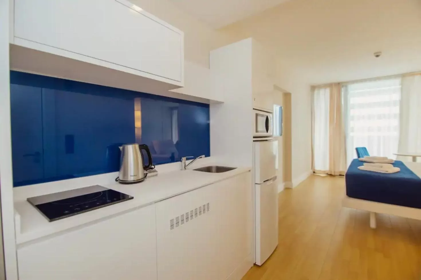Kitchen/Kitchenette in Orbi City Batumi With Sea View
