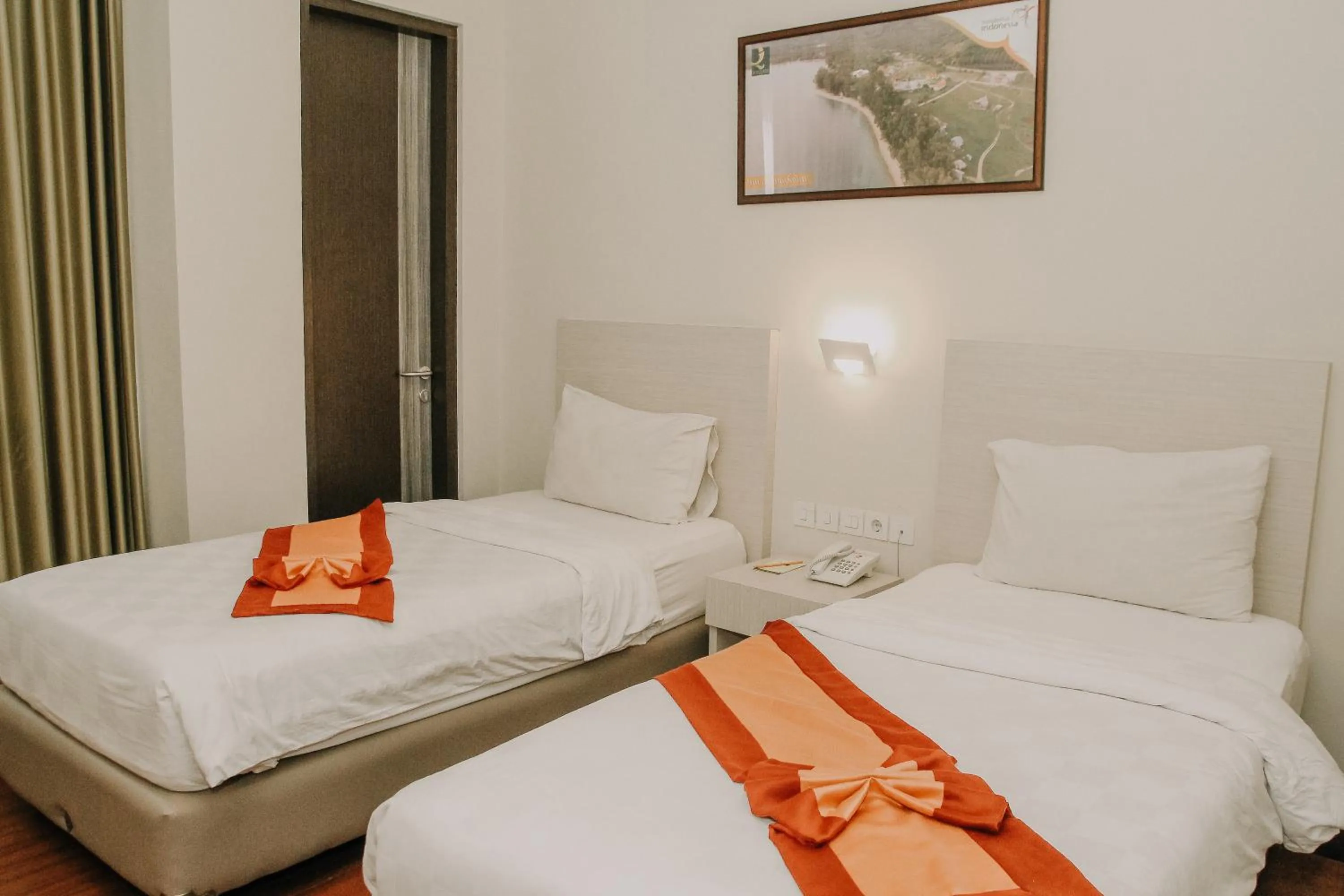 Bed in Hotel Grand Q Gorontalo