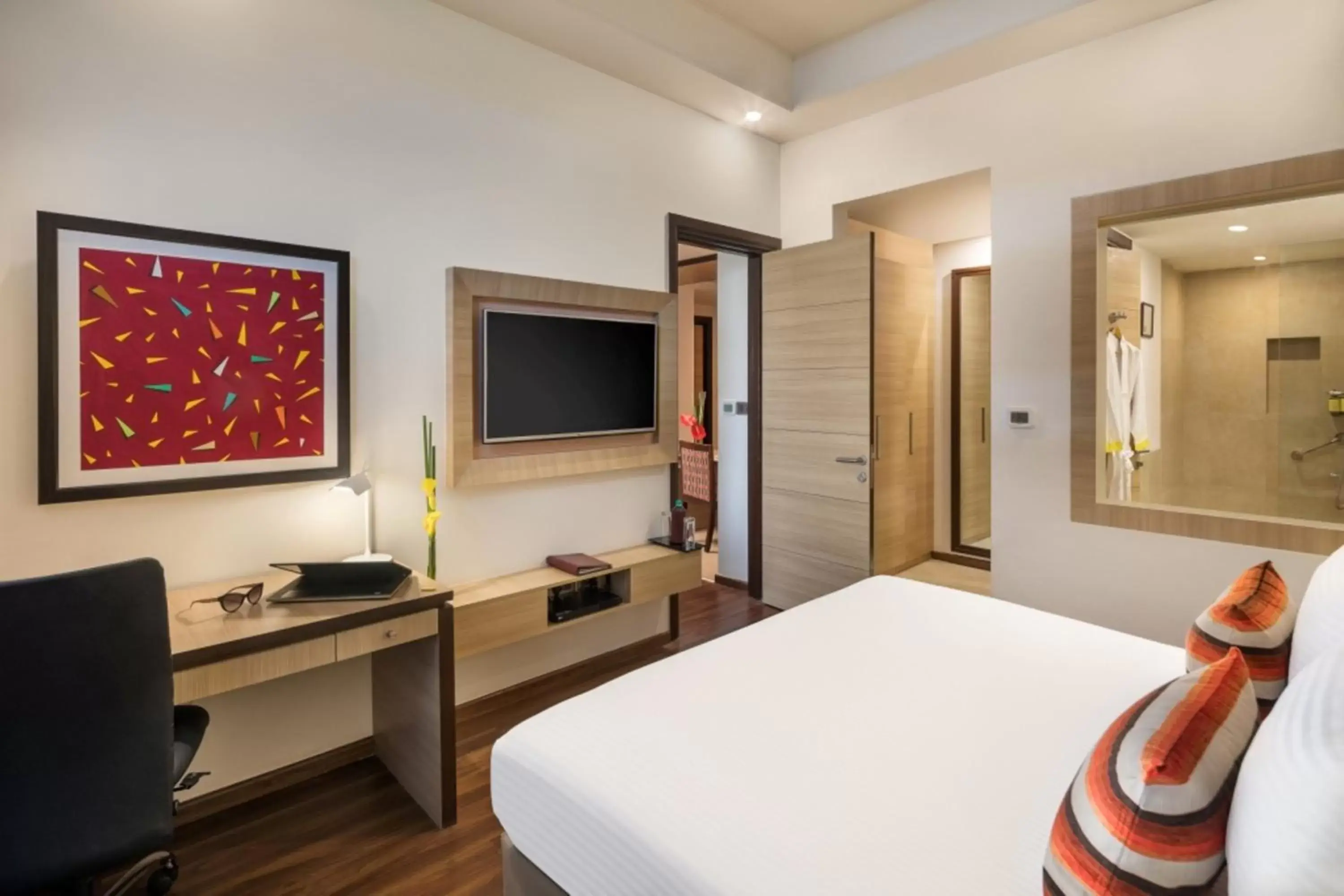 Bedroom, Bed in Sandal Suites by Lemon Tree Hotels