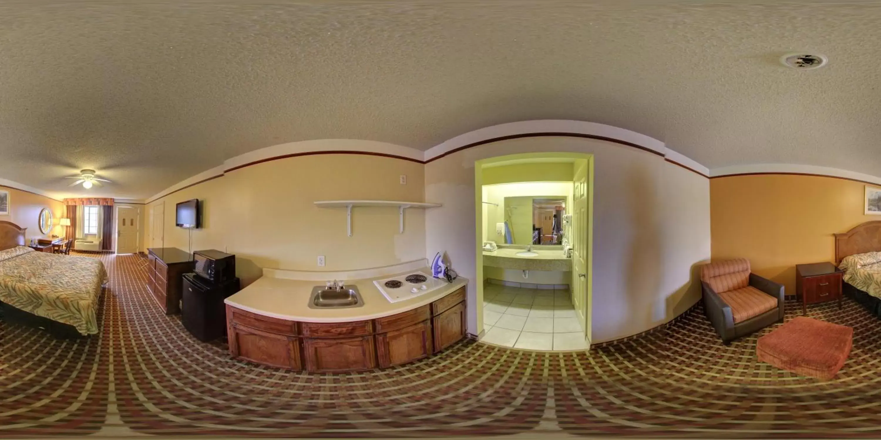 Kitchen or kitchenette in Deluxe Inn and Suites