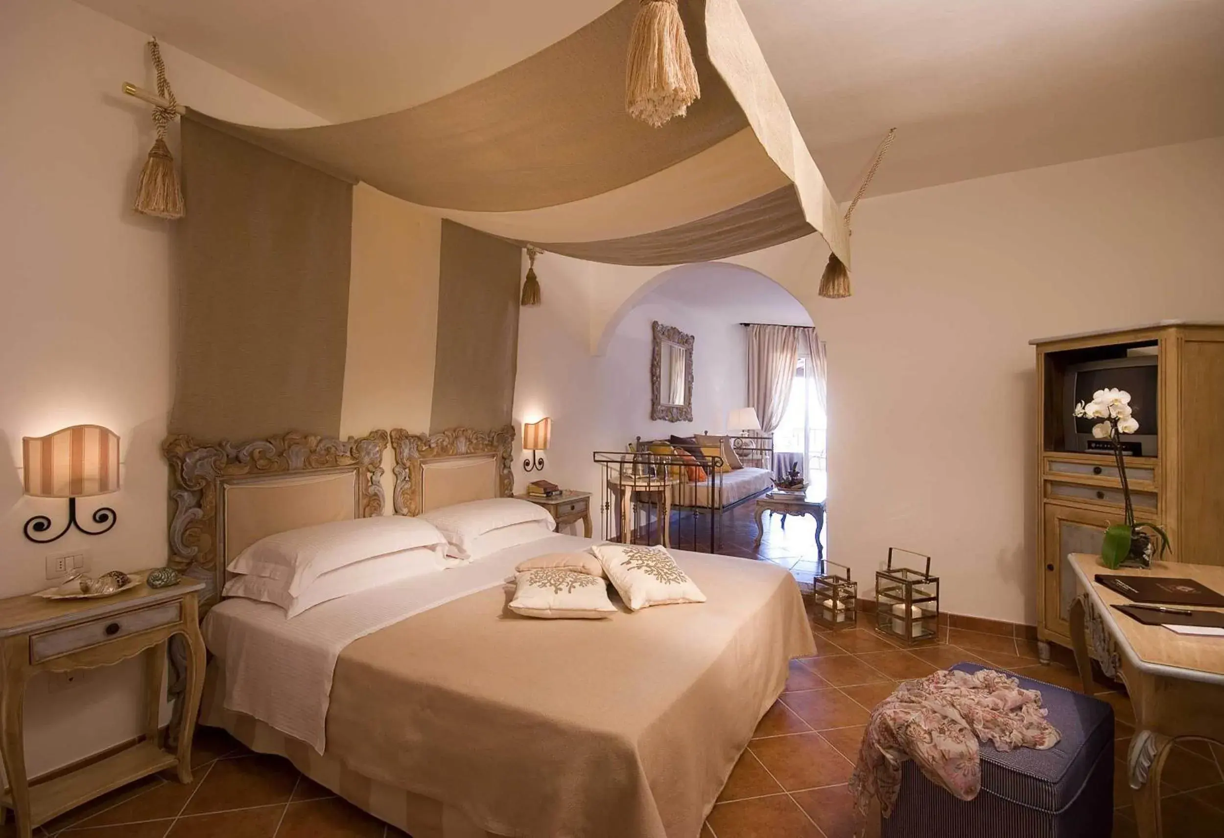 Photo of the whole room, Bed in Colonna Grand Hotel Capo Testa