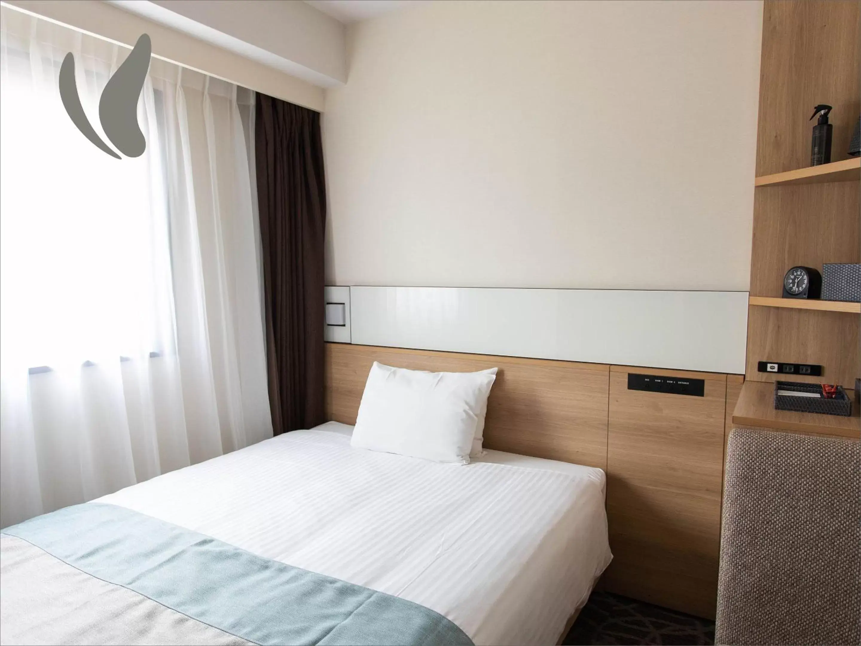 Bed in Hotel Hokke Club Naha Shintoshin Bed in Hotel Hokke Club Naha Shintoshin