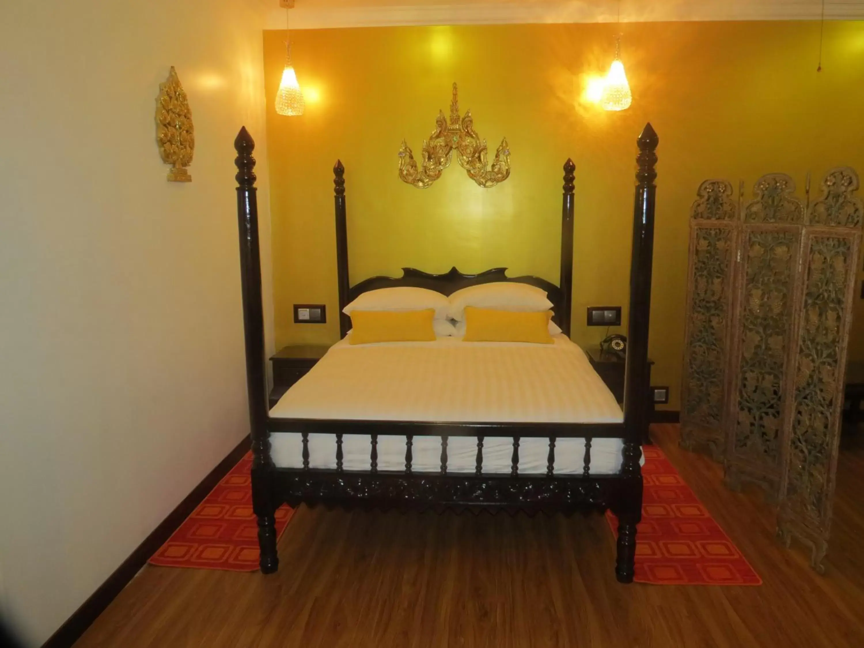 Bed in Beyond Yangon Inn