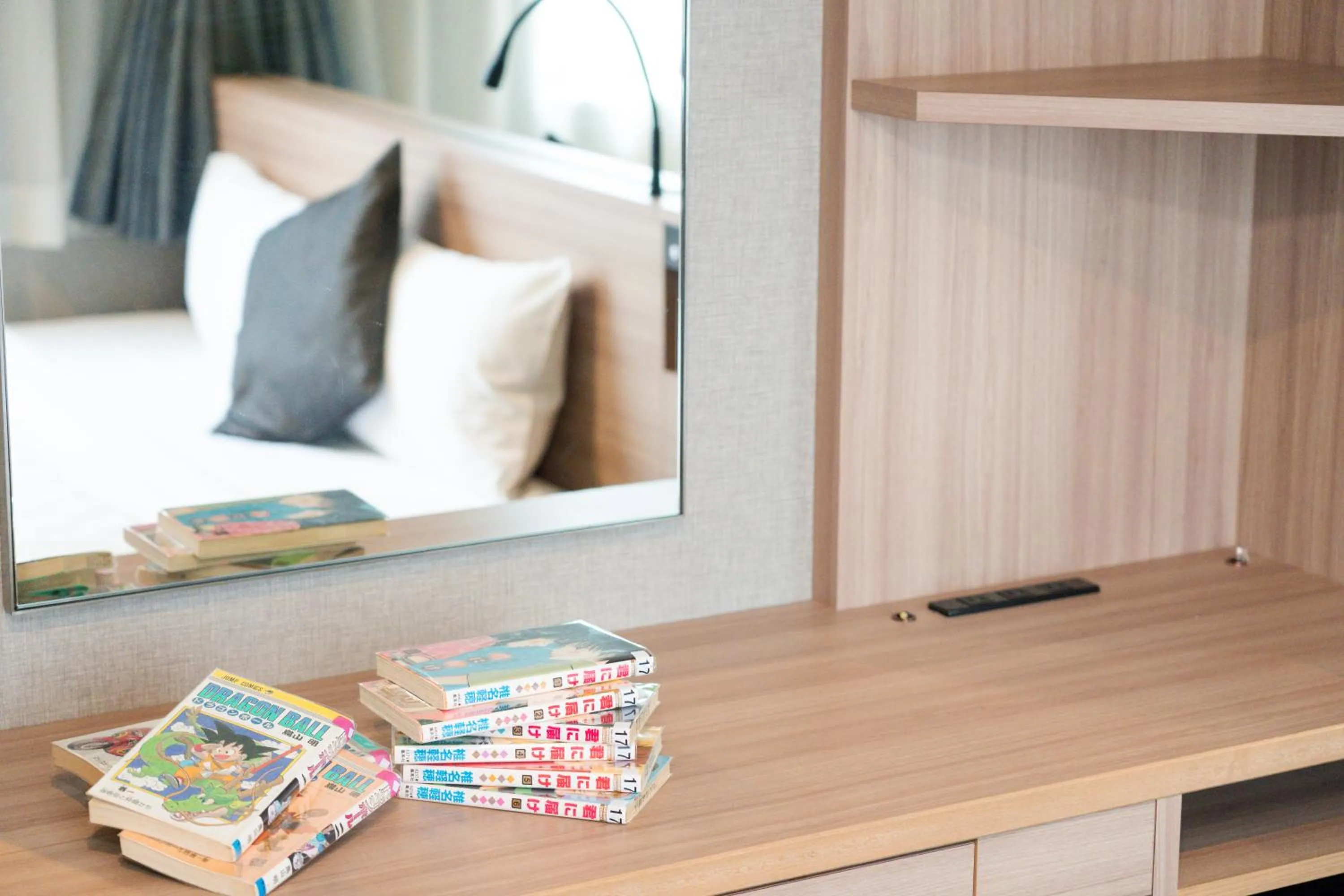 Photo of the whole room in Quintessa Hotel Osaka Shinsaibashi Comic & Books