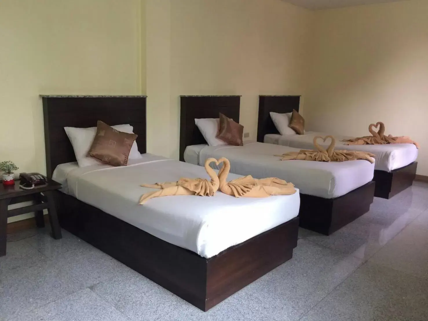 Bed in Diamond Park Inn Chiangrai & Resort Bed in Diamond Park Inn Chiangrai & Resort