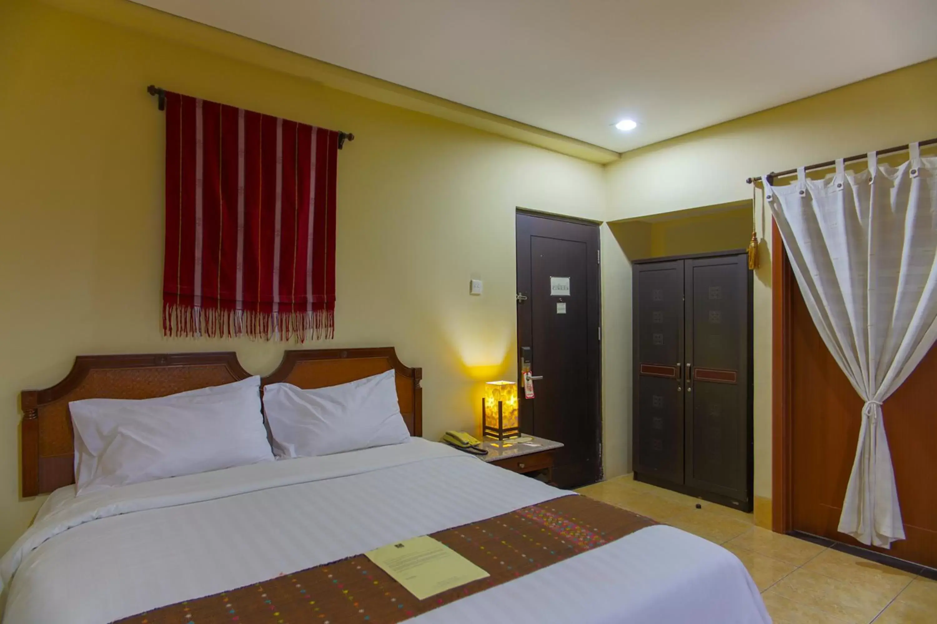 Bed in The Jayakarta Suites Komodo Flores