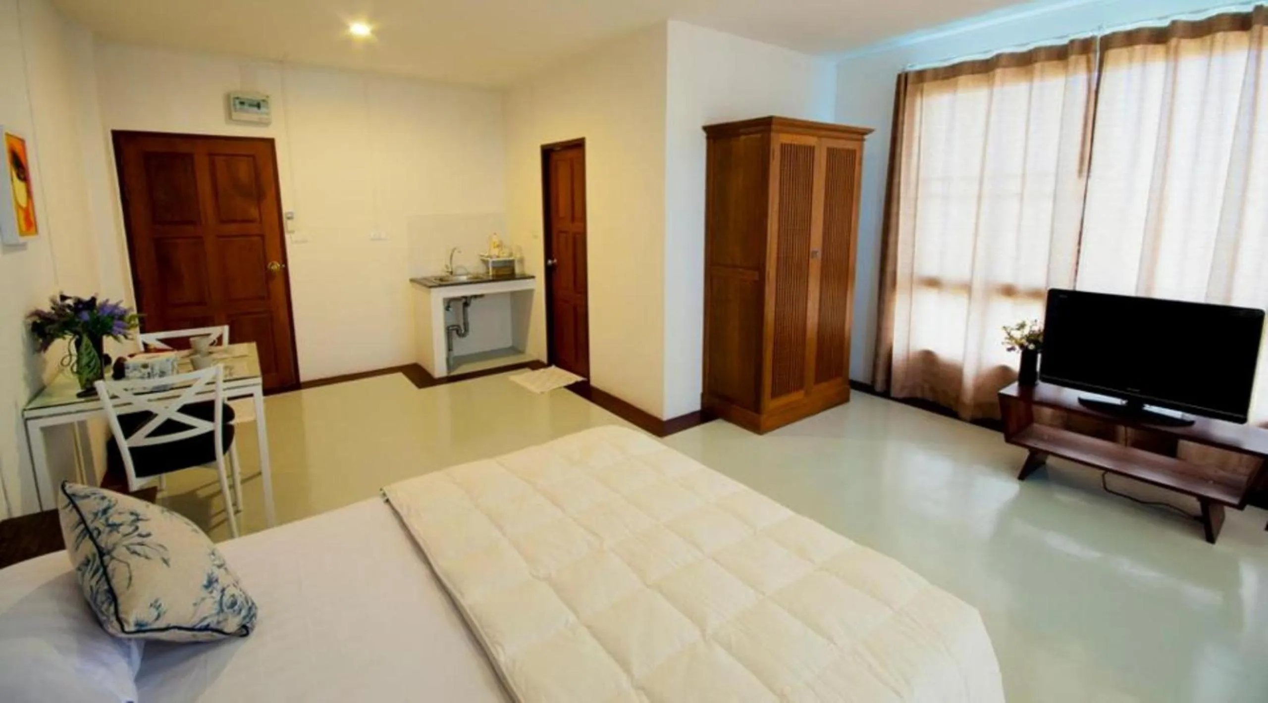 Bed in The Meet Green Apartment