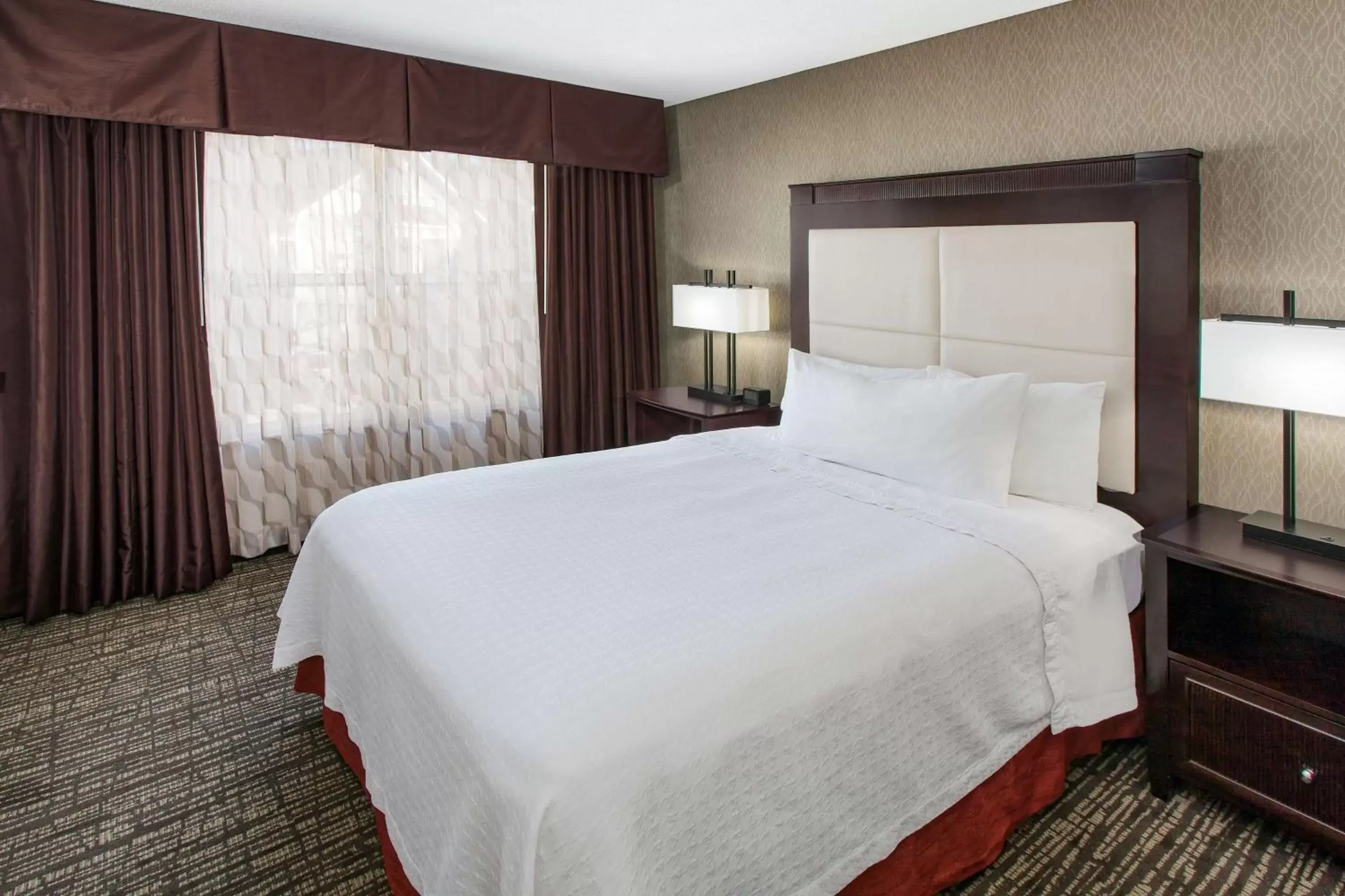Bed in Homewood Suites by Hilton Indianapolis At The Crossing