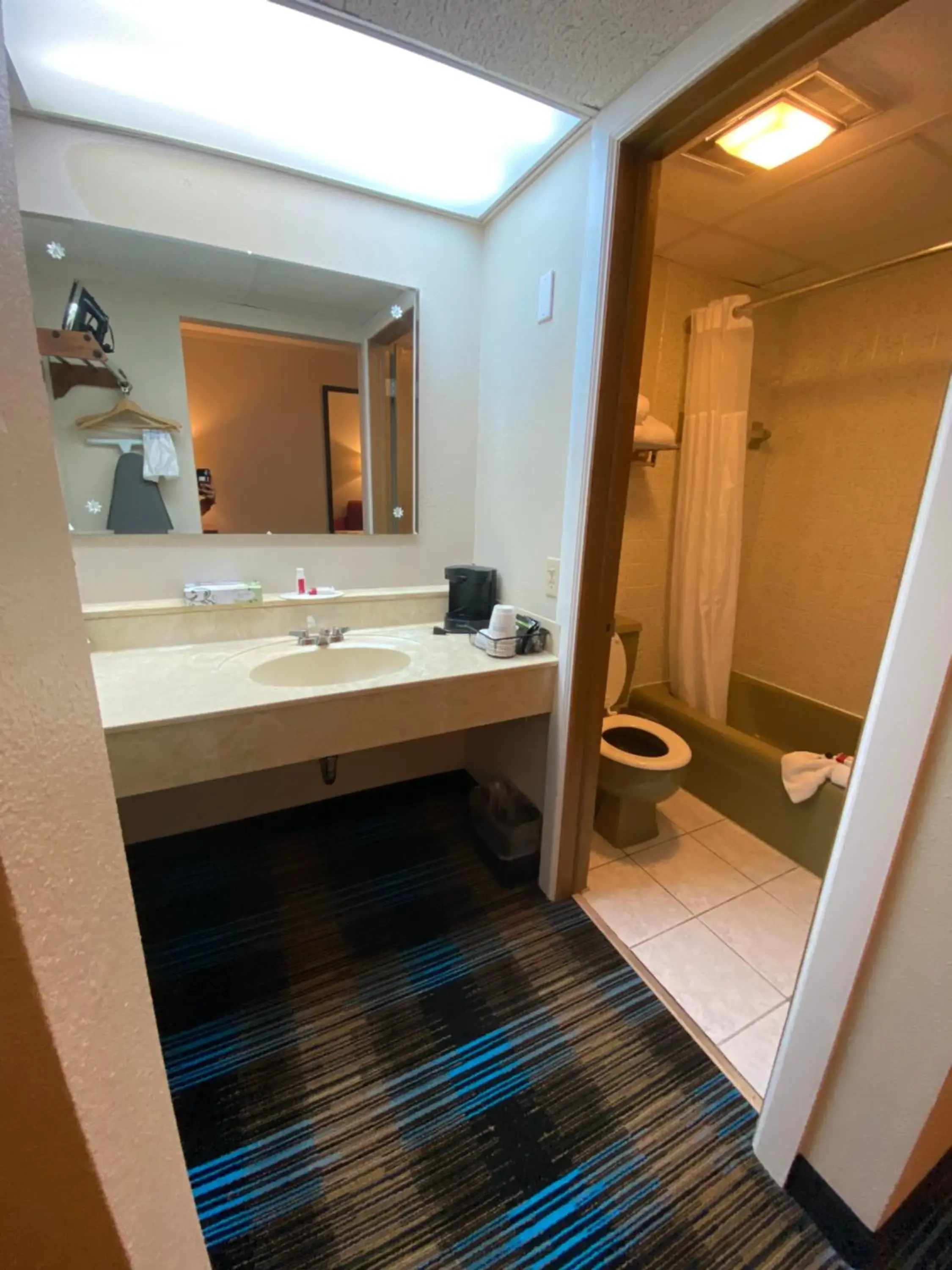 Shower, Bathroom in Days Inn & Suites by Wyndham St. Ignace Lakefront