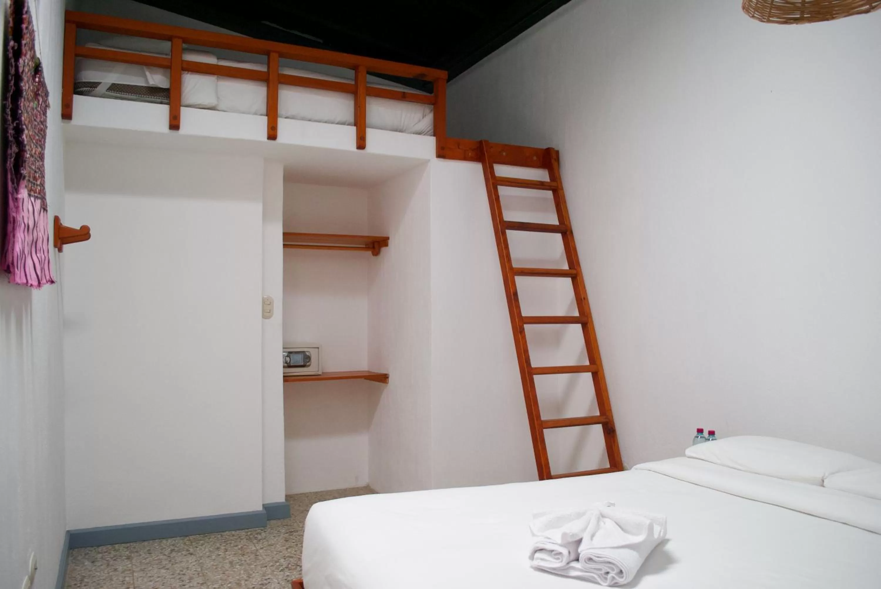 Bed in El Dragon Hotel